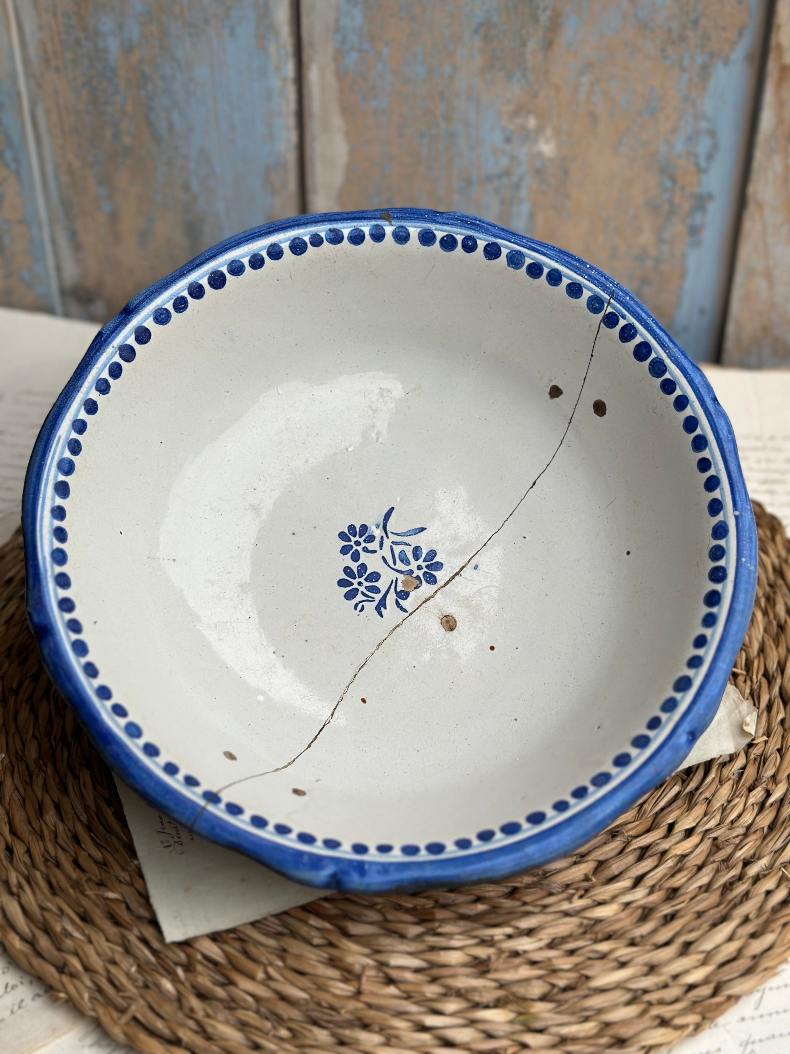 Small 19th-century salad bowl, repaired with staples