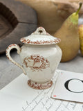 C. Pot à crème terre de fer Choisy le Roi, patiné