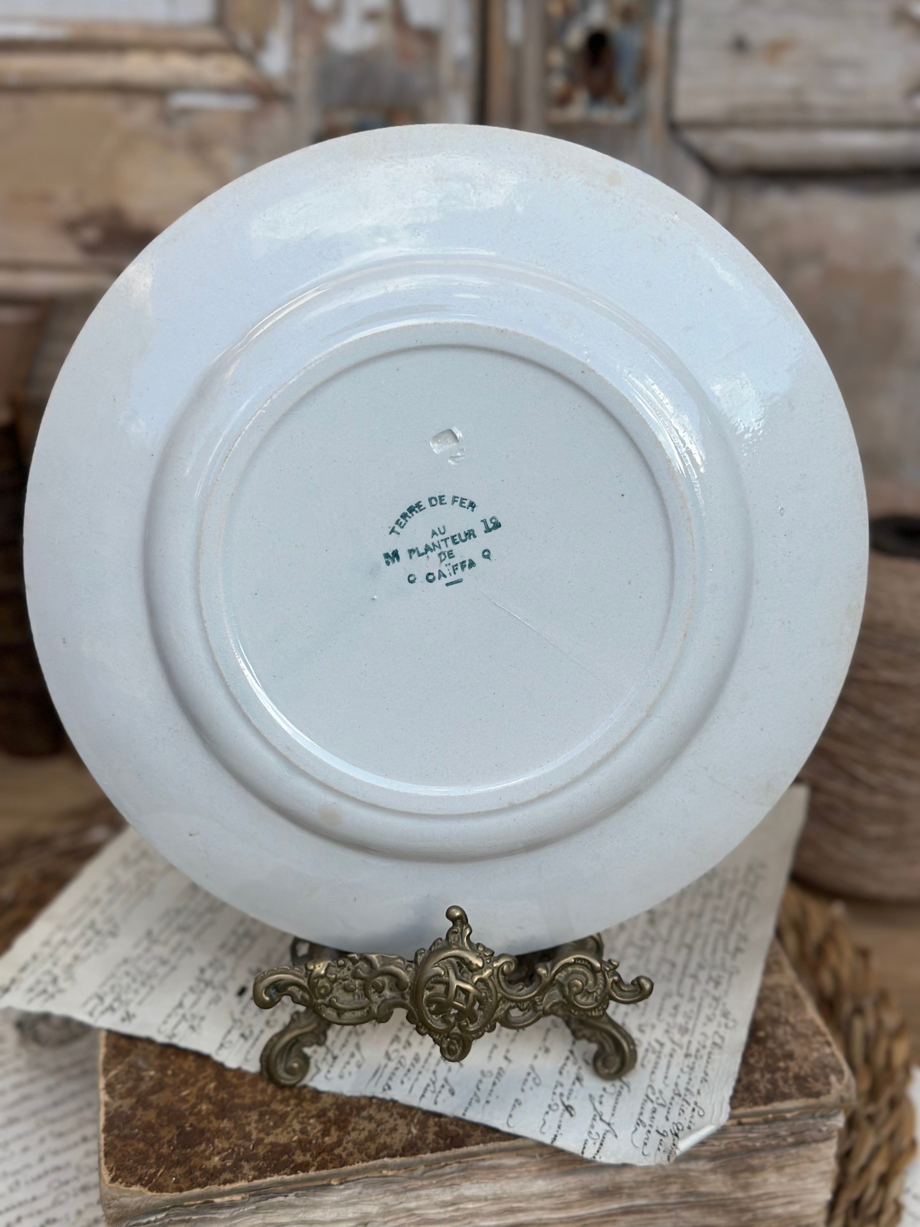 I. Plate with relief Au Planteur de Caïffa (probably Sarreguemines)