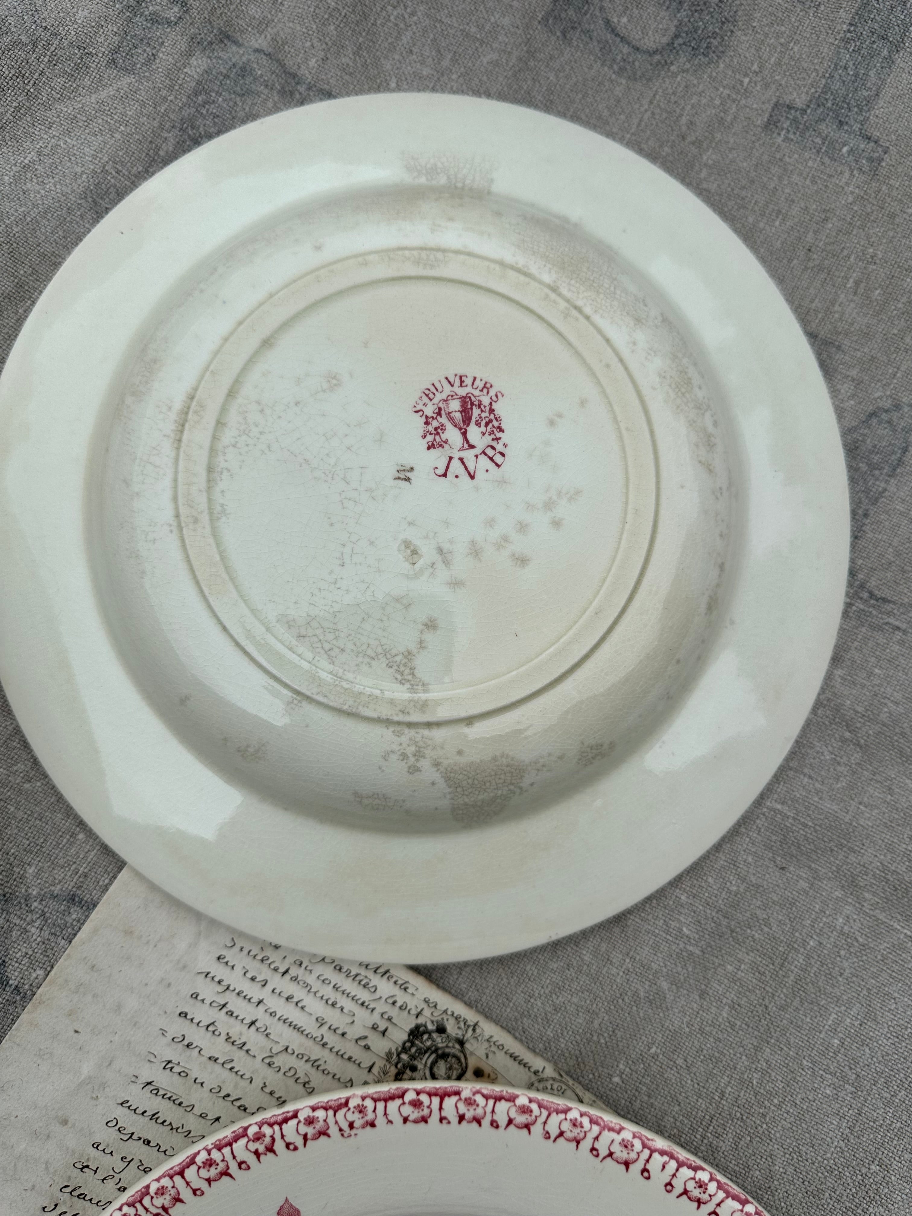 Set of 4 mismatched deep plates