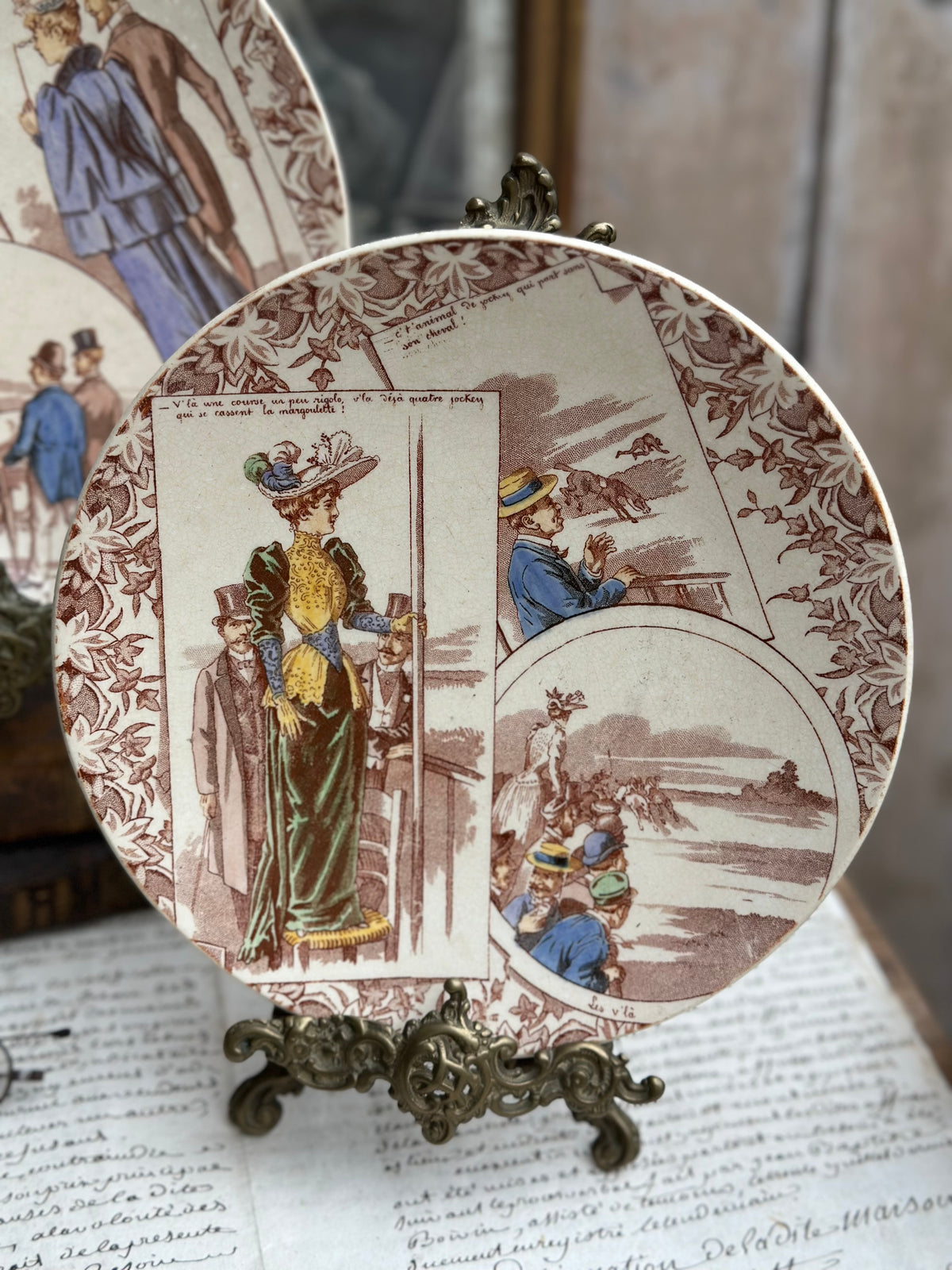 Paire d'assiettes parlantes polychromes Sarreguemines série Courses