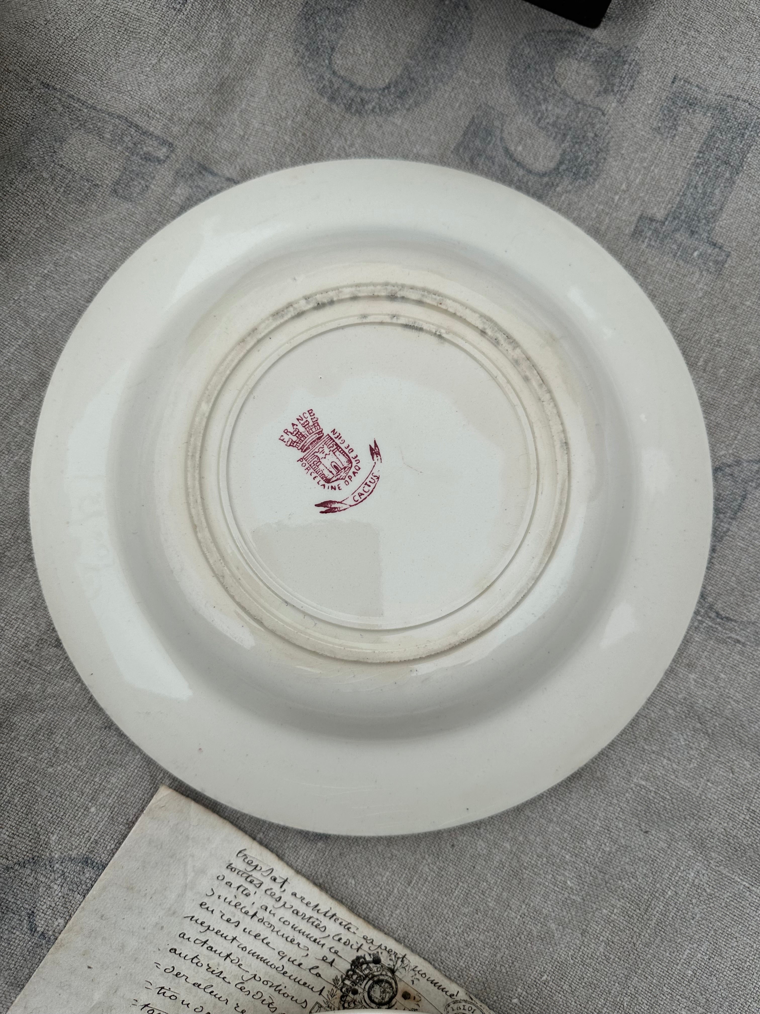Set of 4 mismatched deep plates