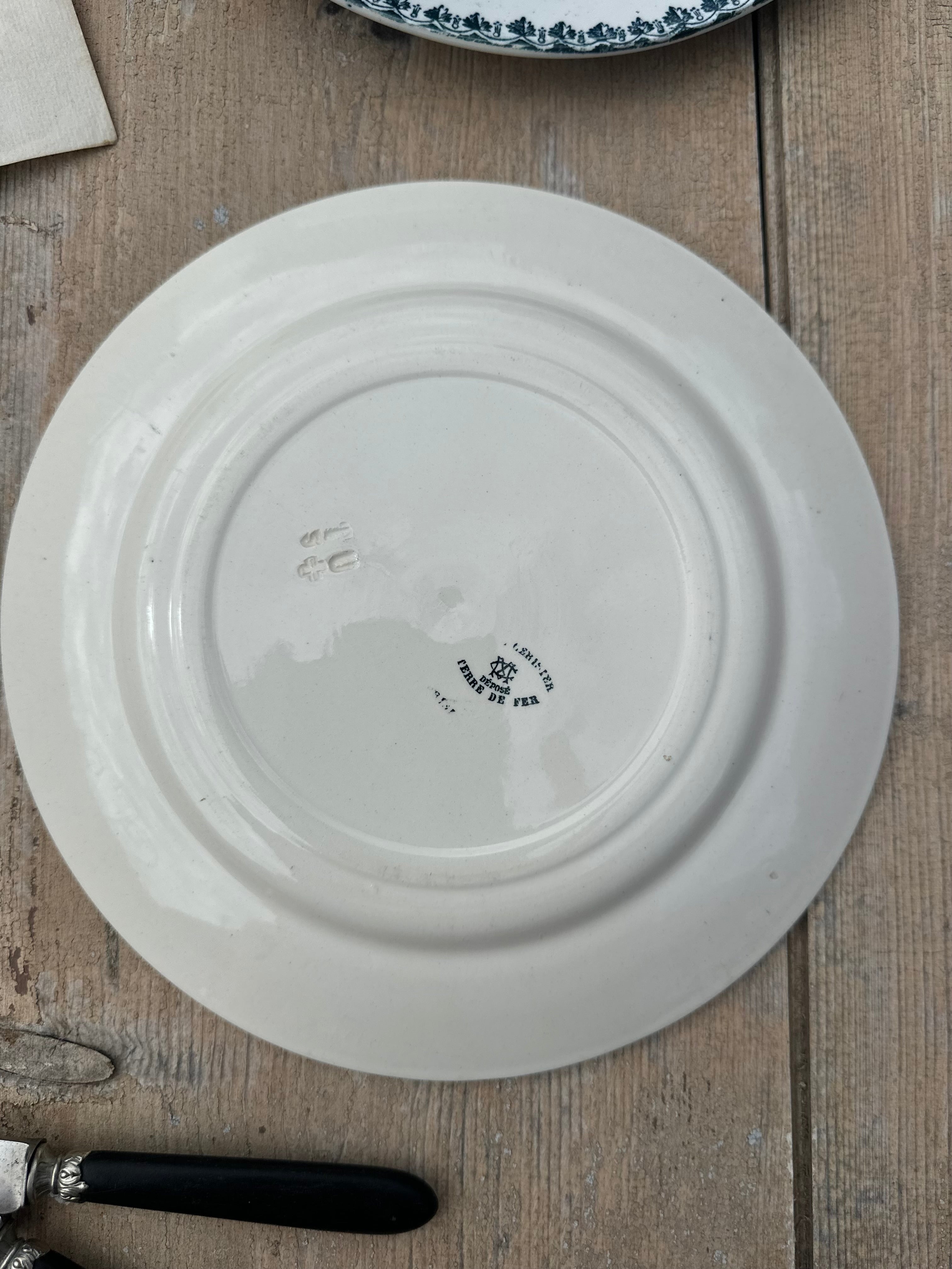 III. Set of 6 mismatched dinner plates