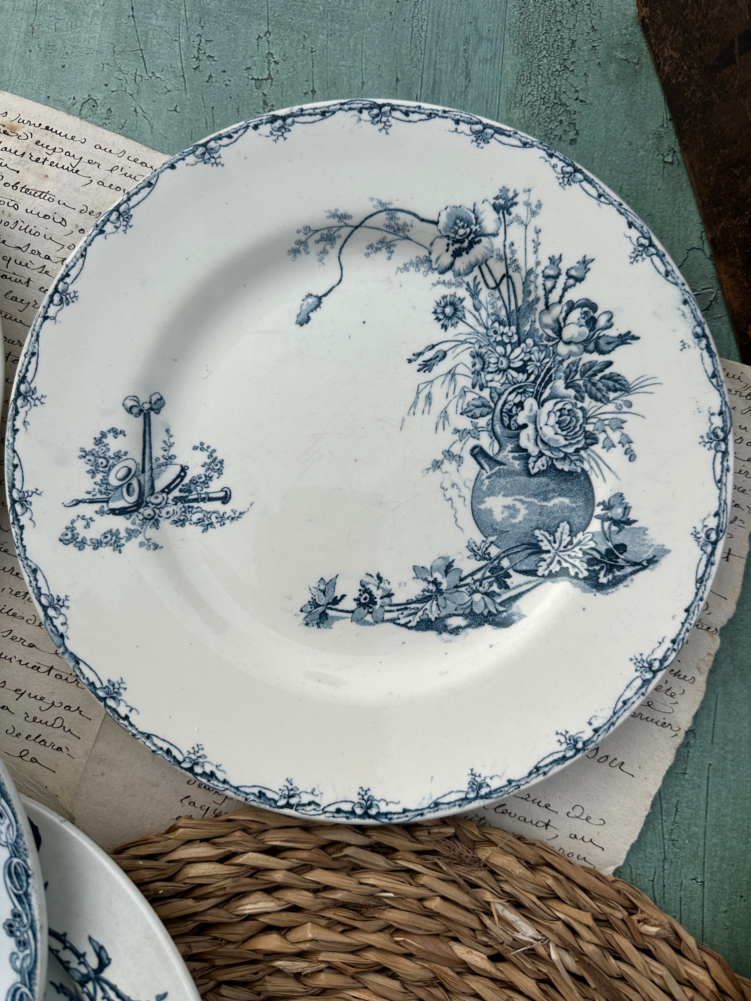 II. Set of 6 mismatched earthenware dinner plates