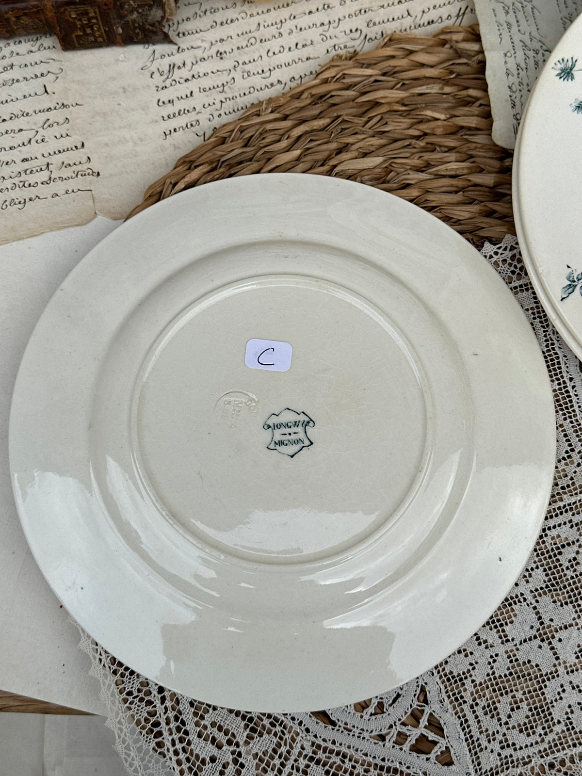 C. Suite de 5 assiettes à dessert Longwy modèle Mignon