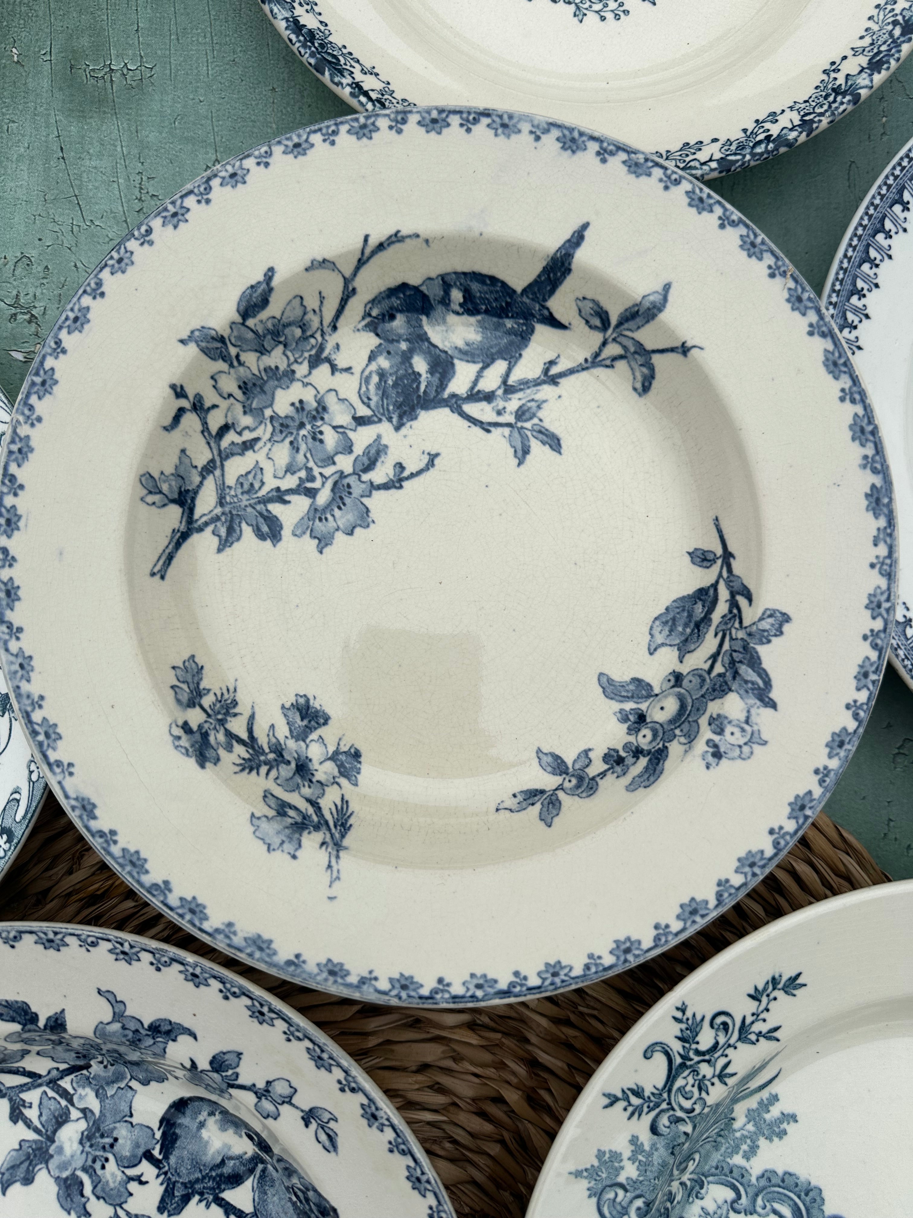 II. Set of 6 mismatched ironstone soup plates