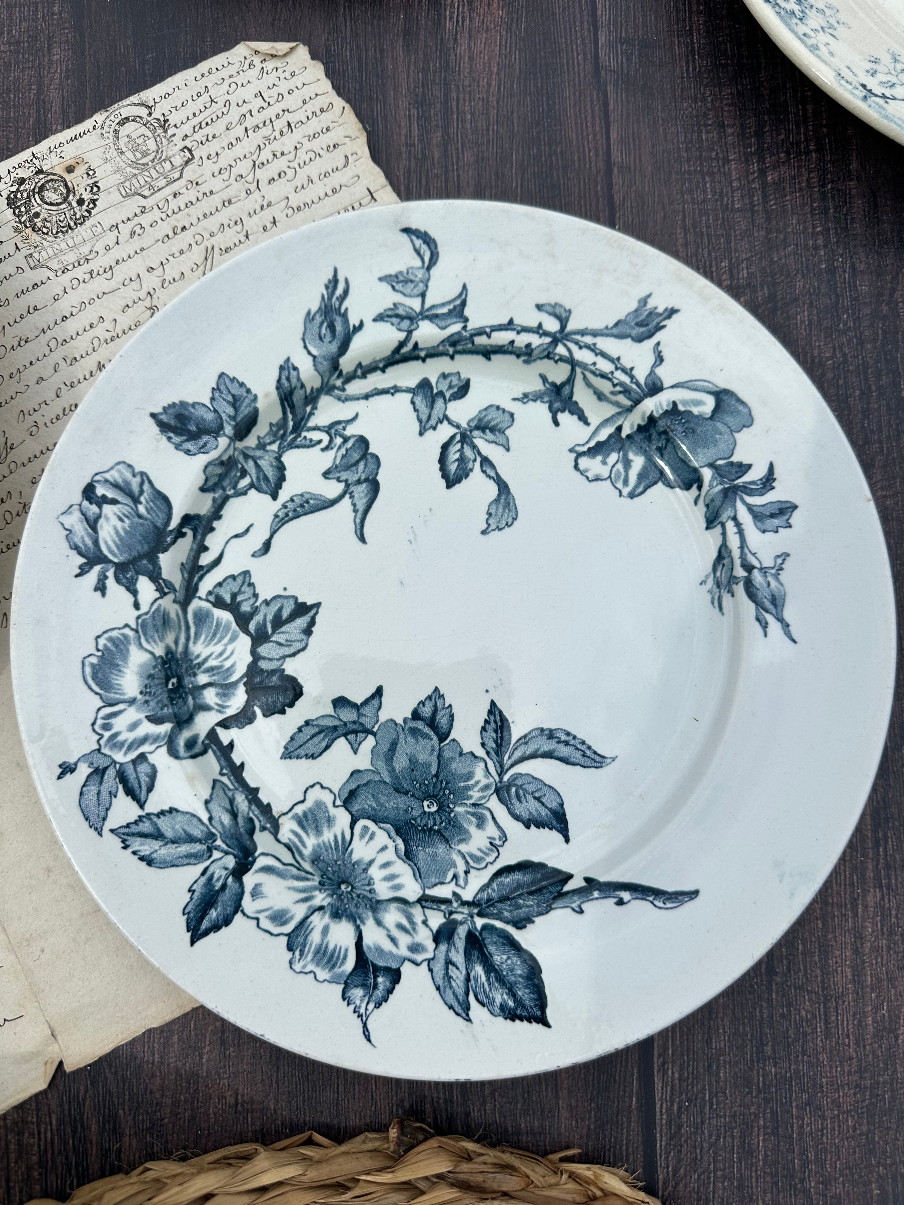 Set of 8 mismatched ironstone dinner plates