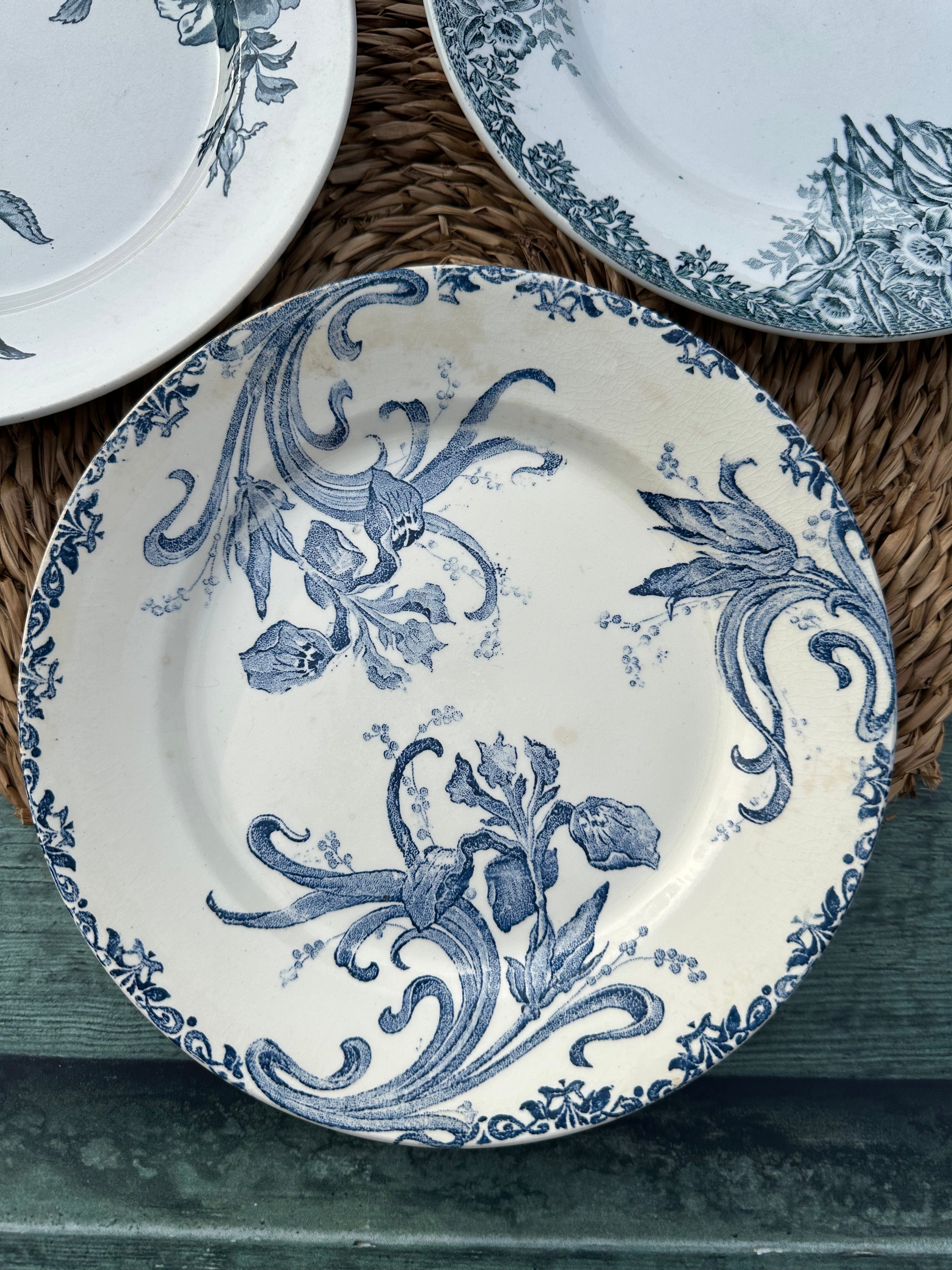 II. Set of 6 mismatched earthenware dinner plates