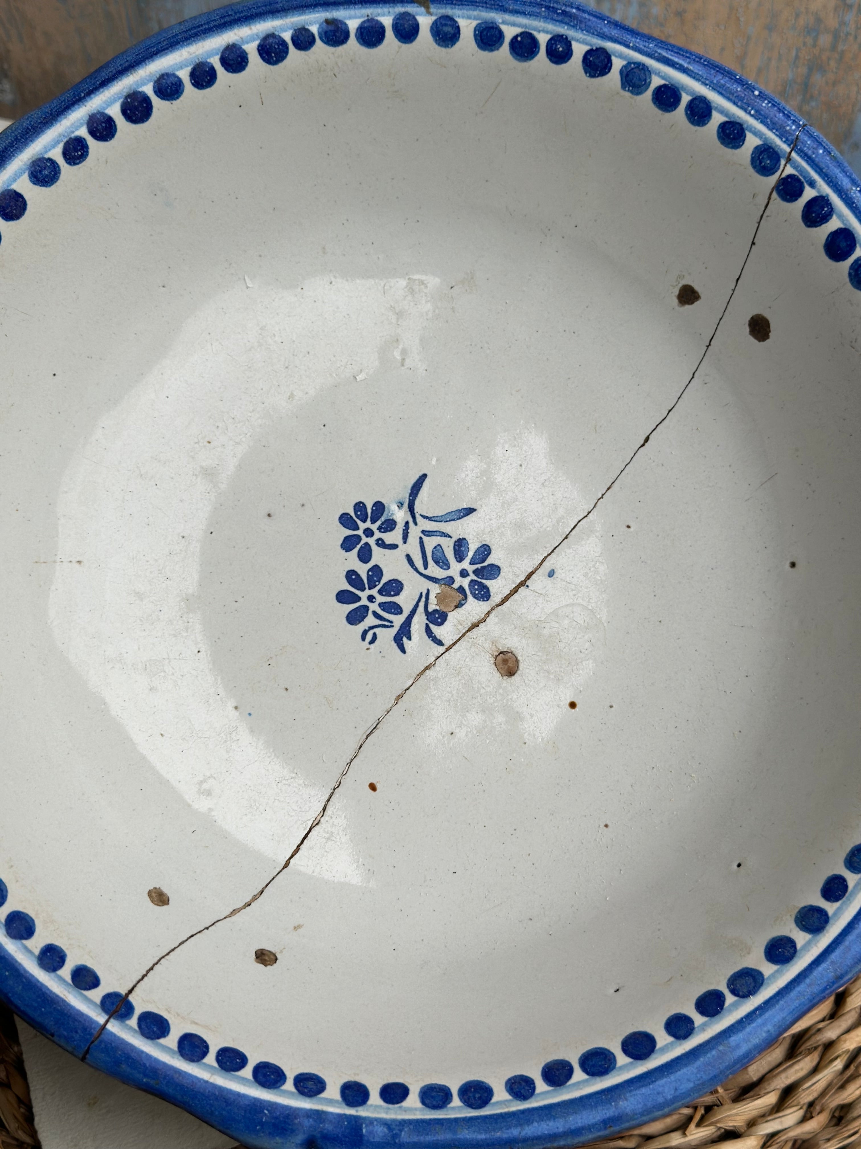 Small 19th-century salad bowl, repaired with staples