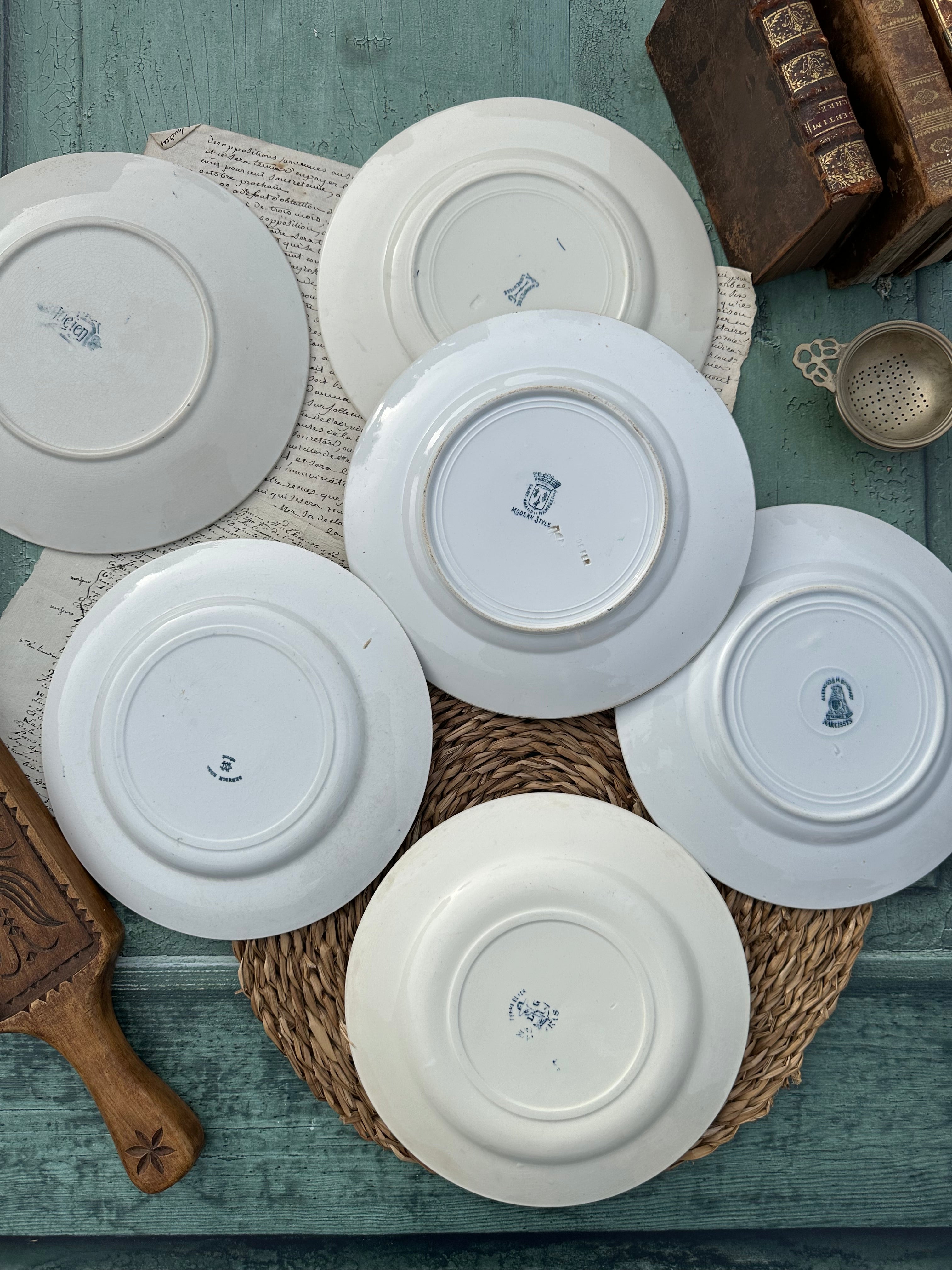 II. Set of 6 mismatched earthenware dinner plates