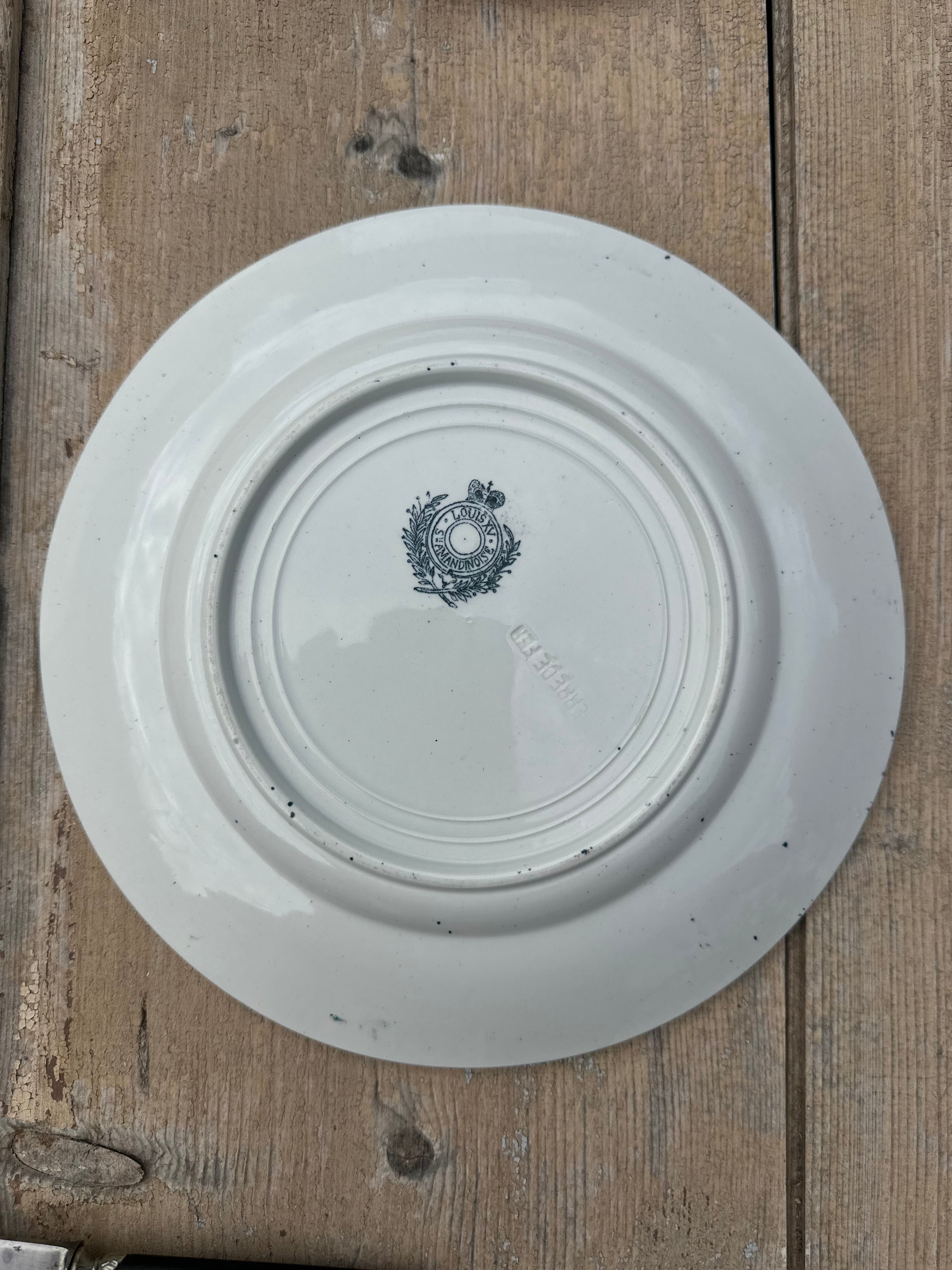 III. Set of 6 mismatched dinner plates