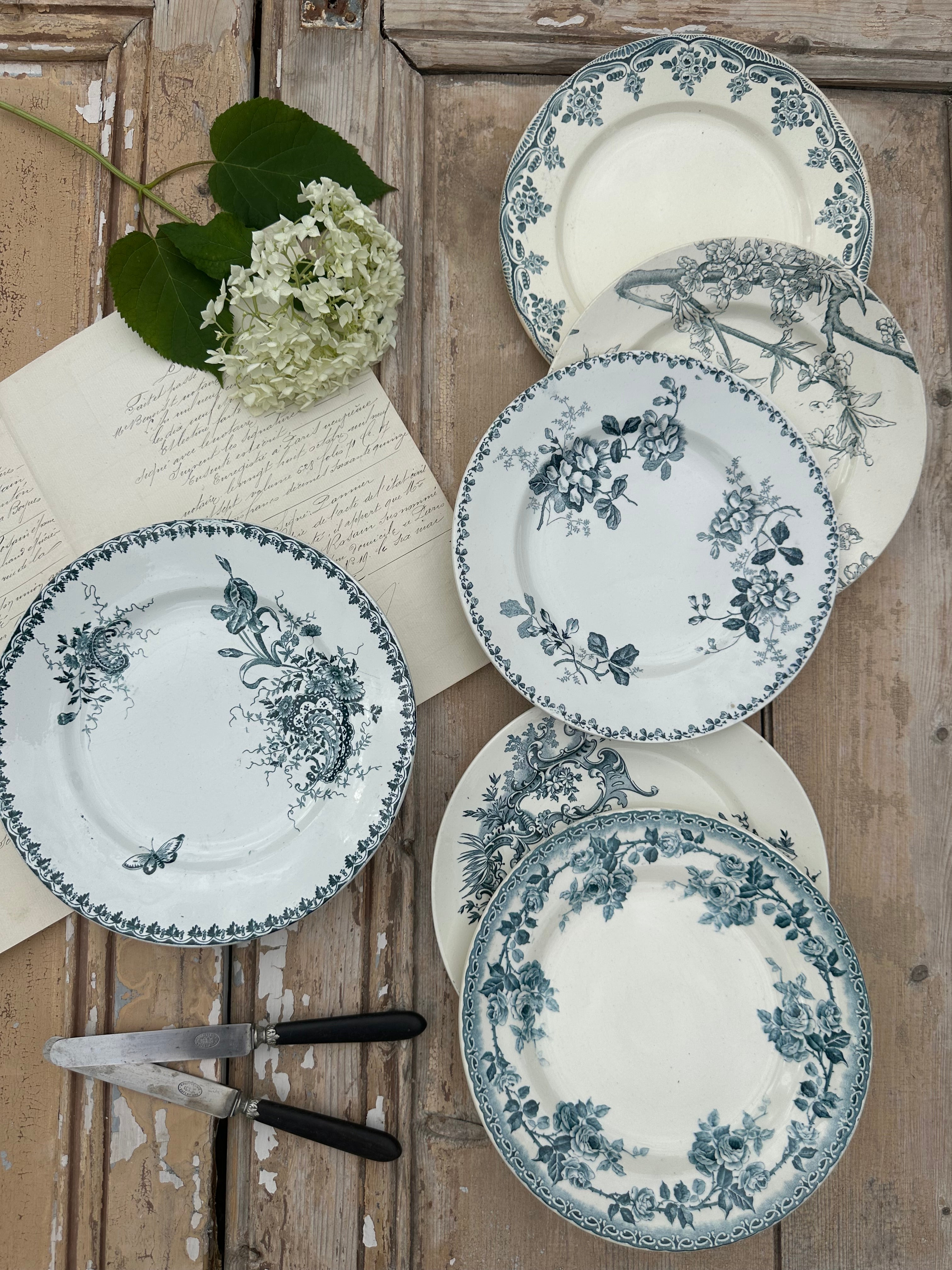 II. Set of 6 mismatched dinner plates