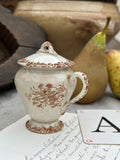 A. Pot à crème terre de fer Choisy le Roi, patiné