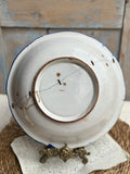 Small 19th-century salad bowl, repaired with staples