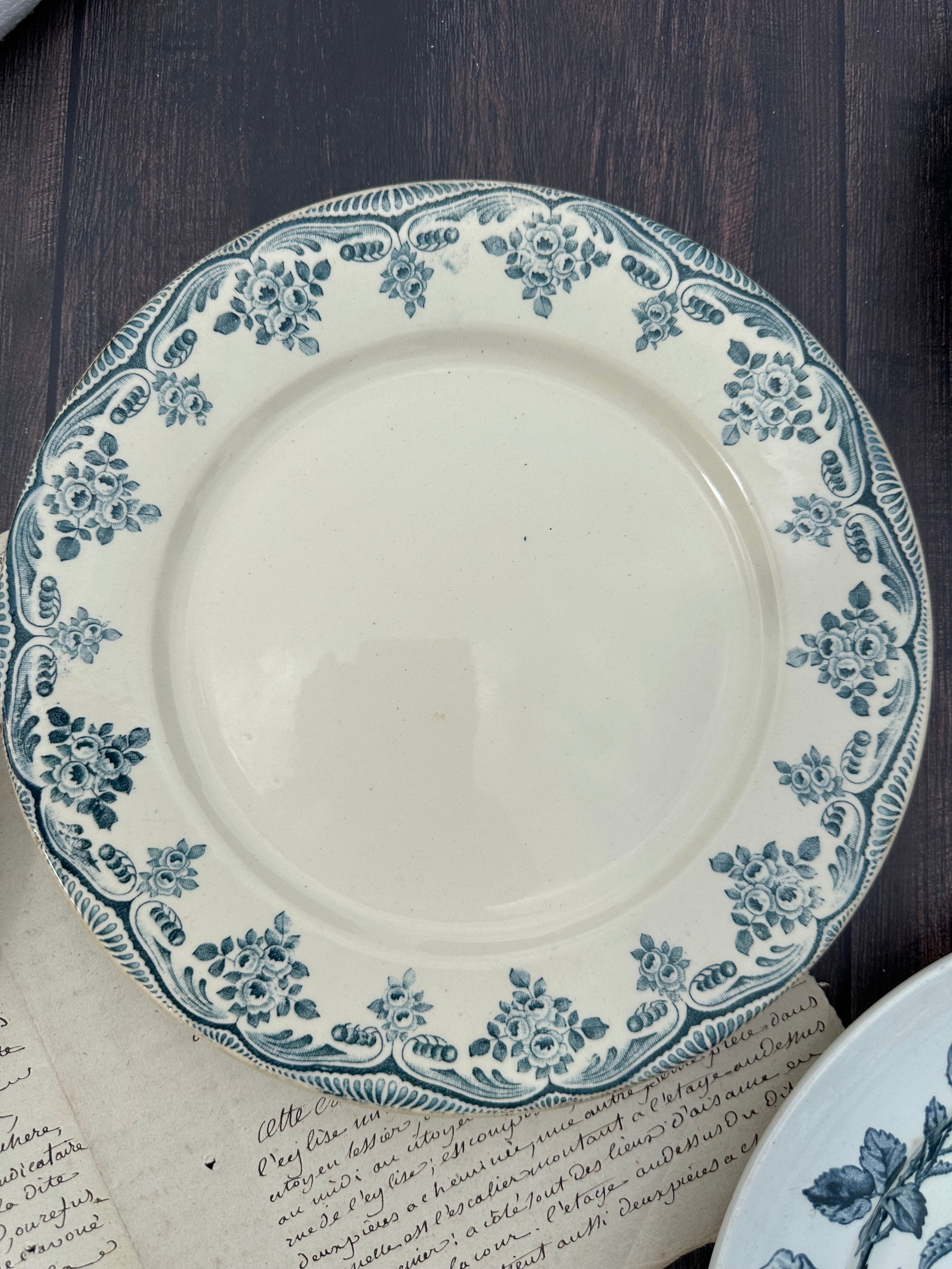 Set of 8 mismatched ironstone dinner plates