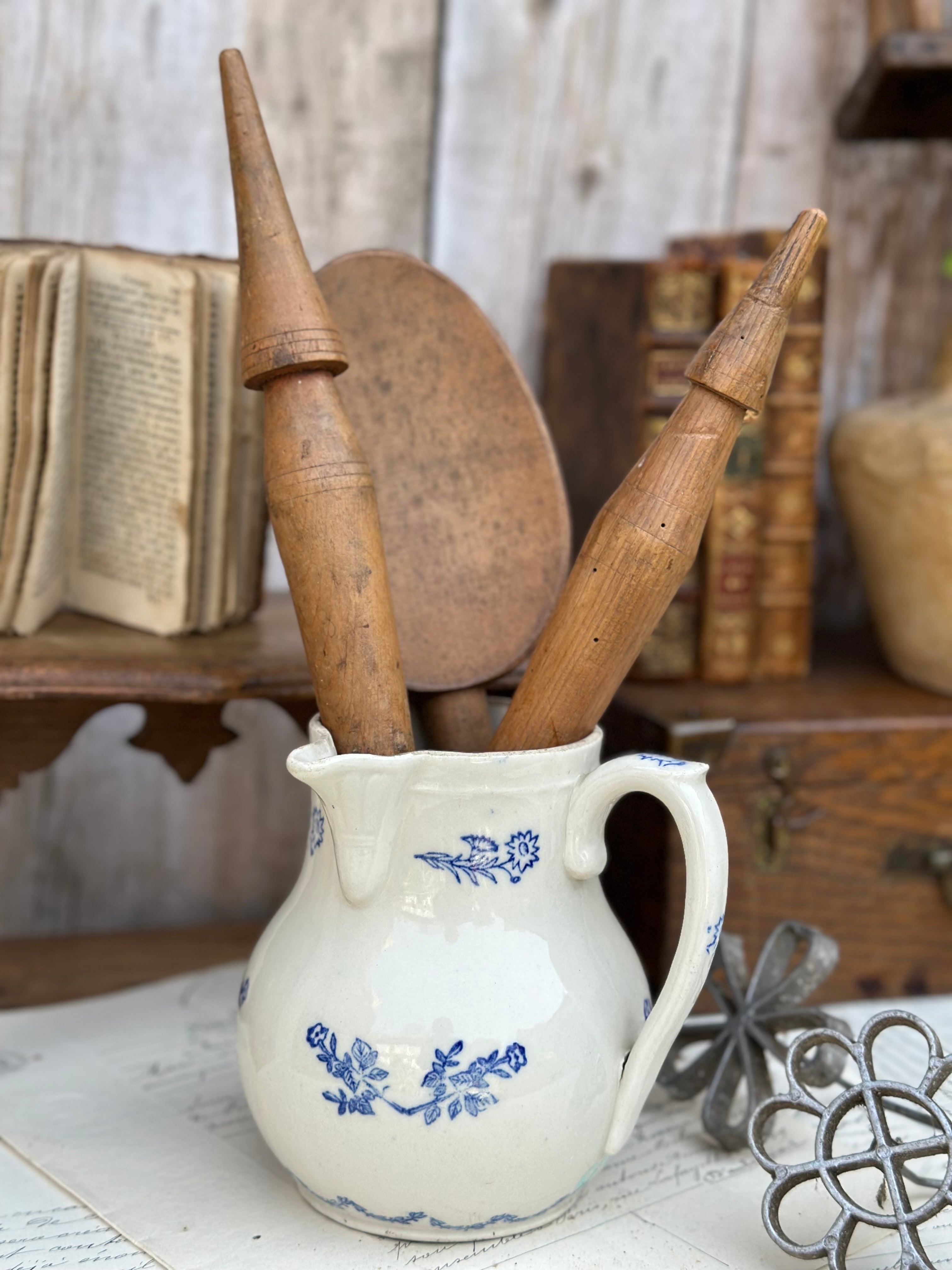 Two spindles for spinning wool