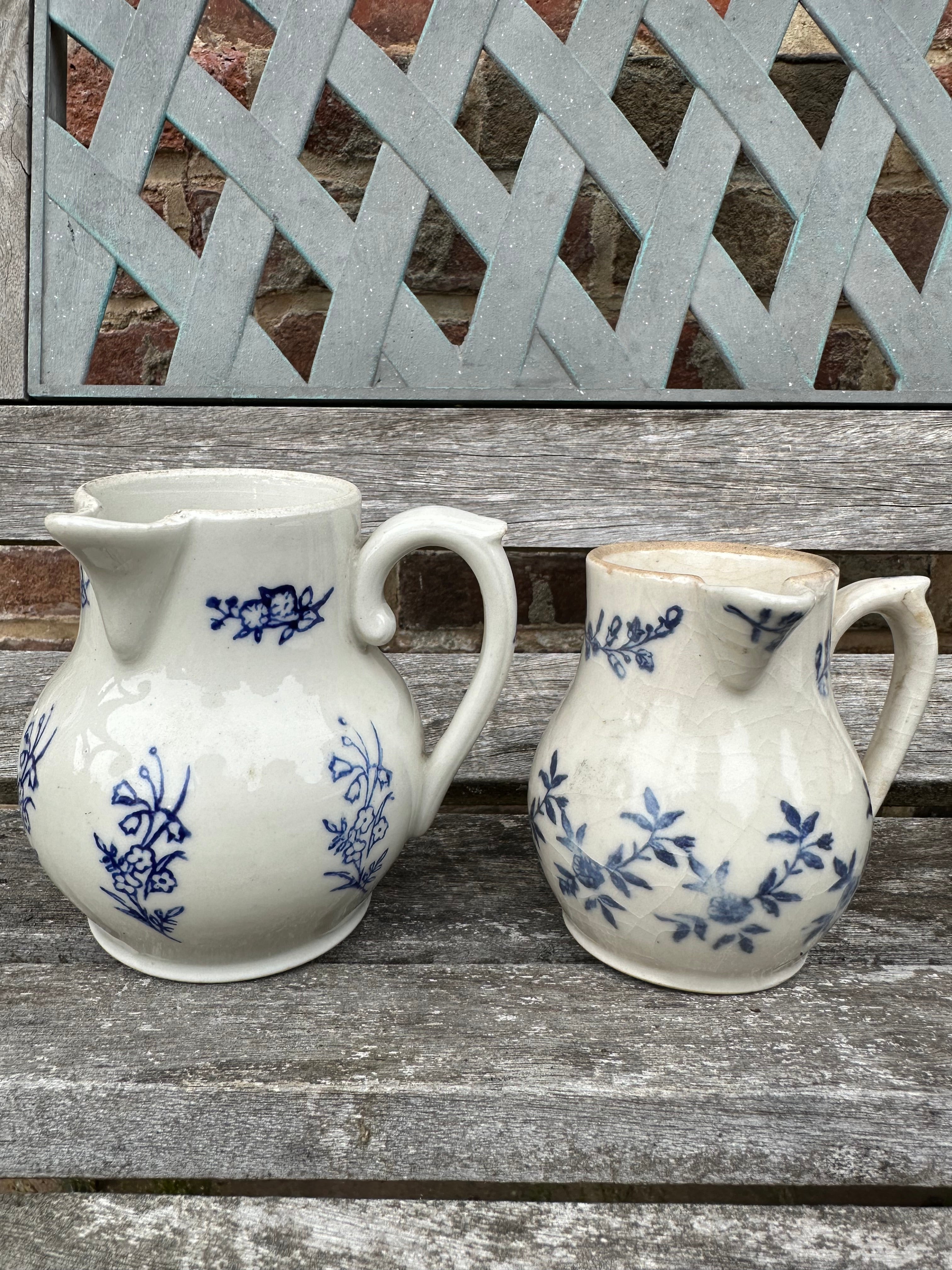 Three small St Uze pitchers