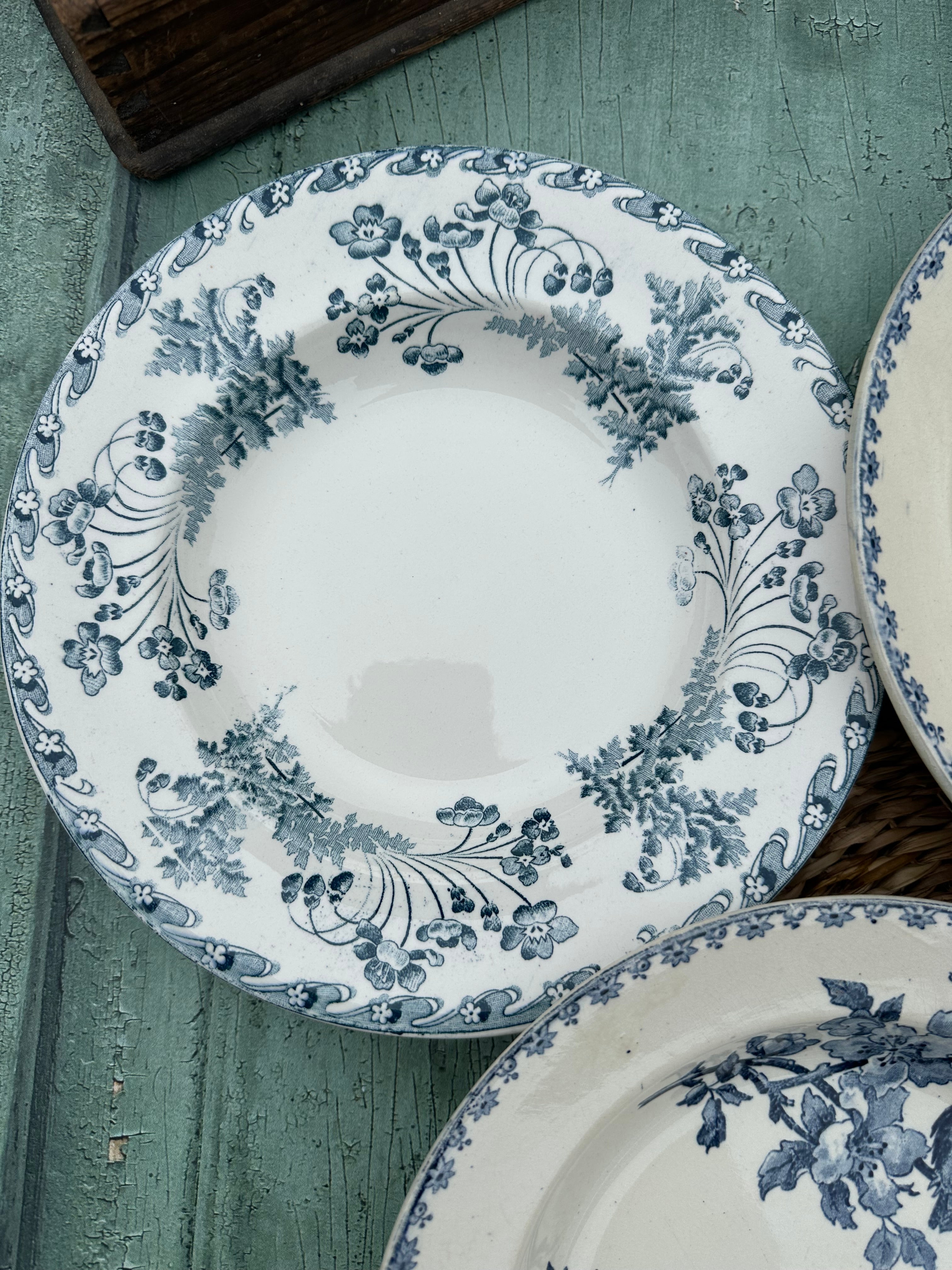 II. Set of 6 mismatched ironstone soup plates