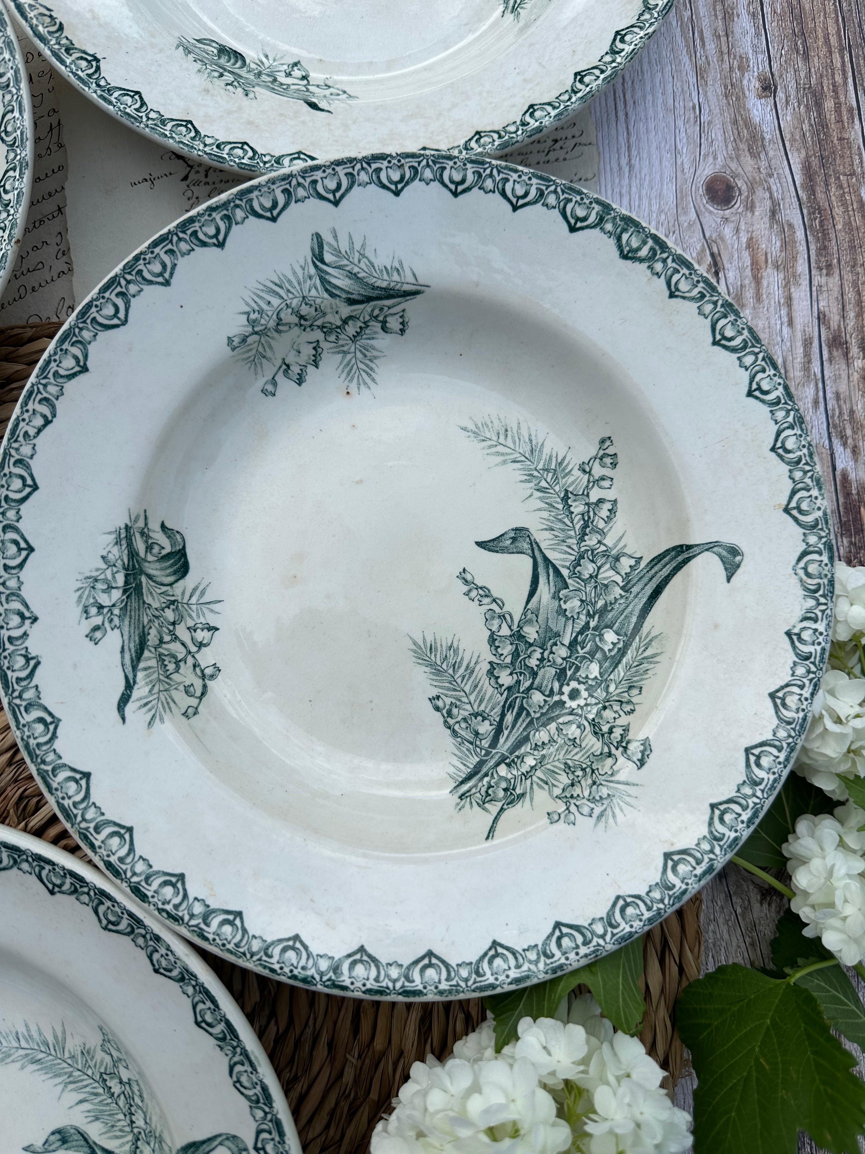 Suite de 4 assiettes creuses St. Amand modèle Muguet