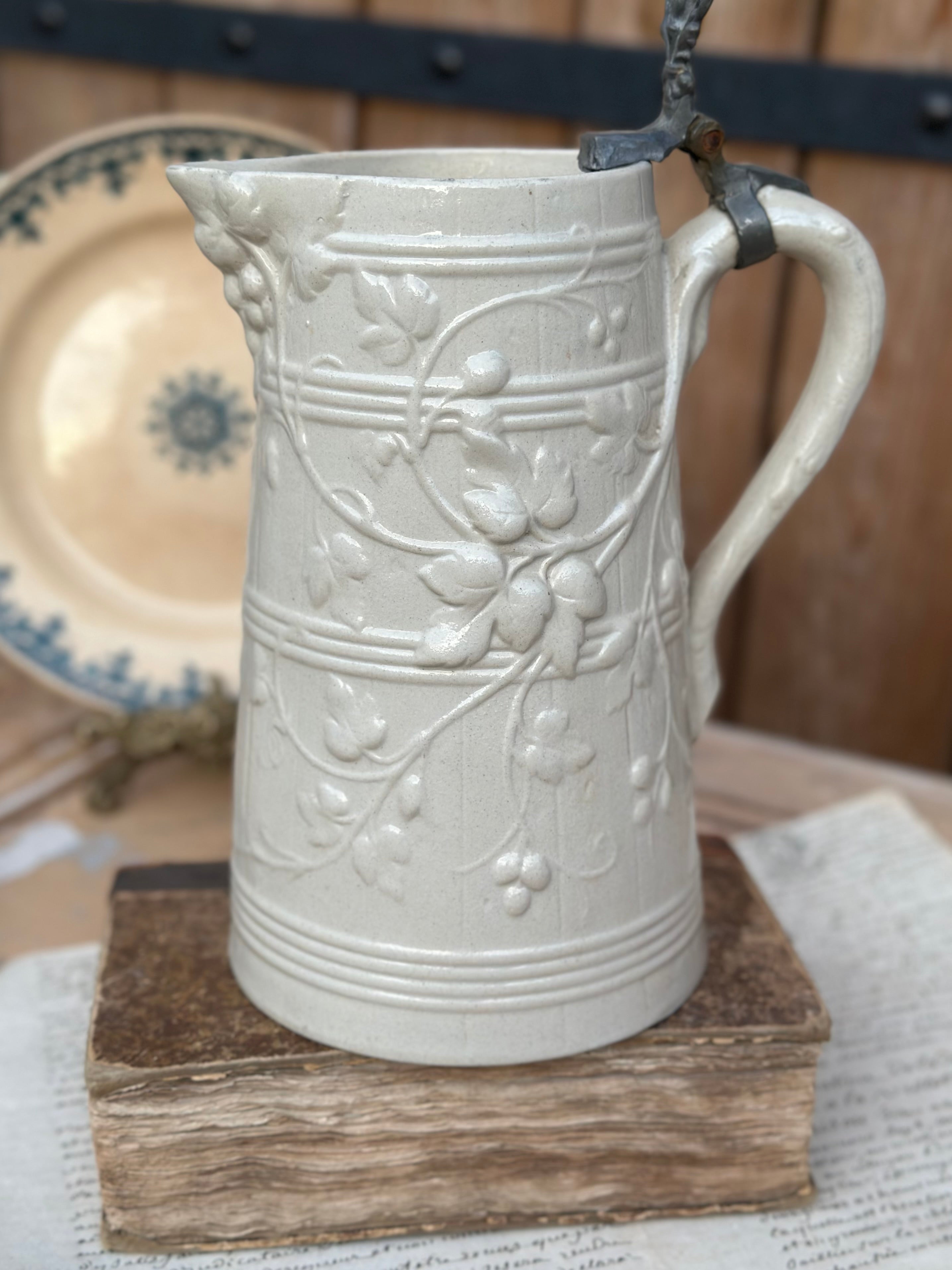 Sublime large glazed stoneware pitcher with relief - 19th century