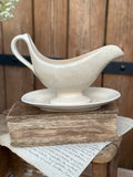 Patinated ironstone gravy boat