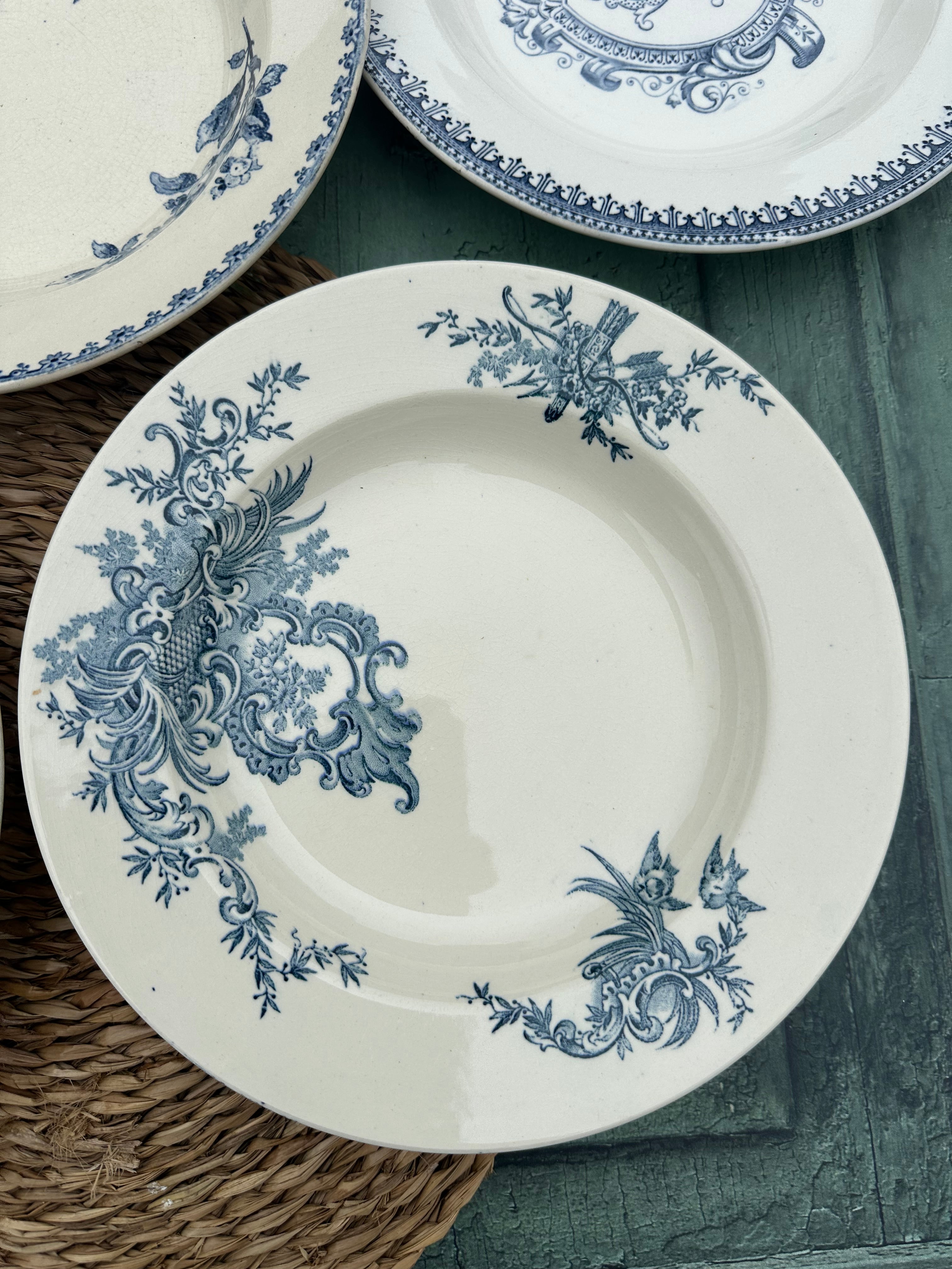 II. Set of 6 mismatched ironstone soup plates