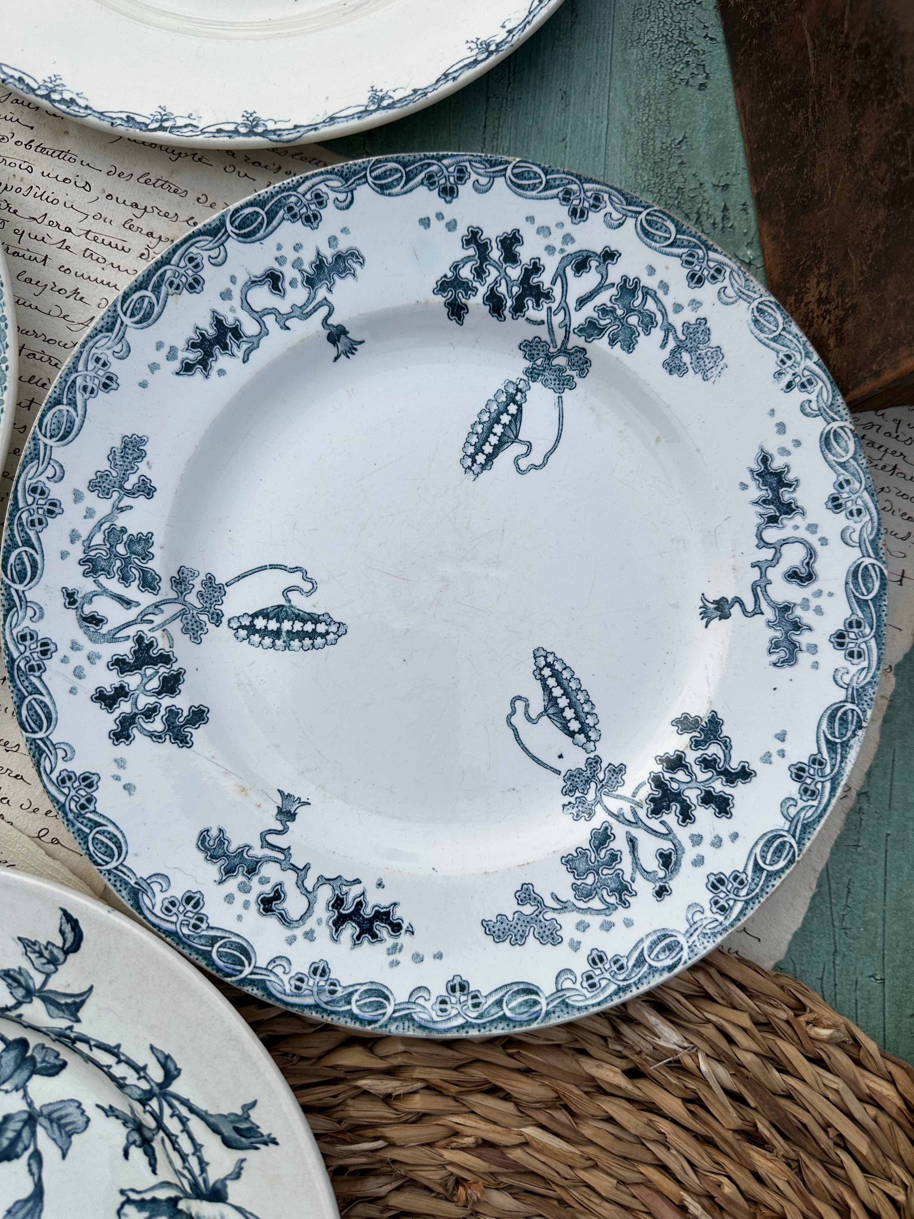 II. Set of 6 mismatched earthenware dinner plates