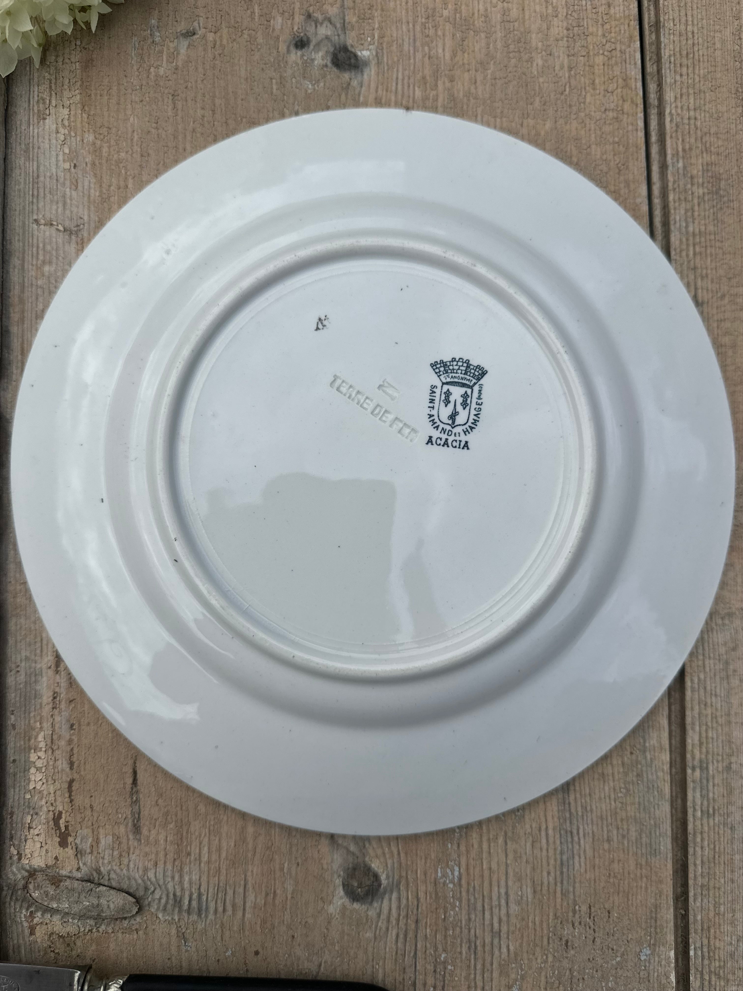 III. Set of 6 mismatched dinner plates