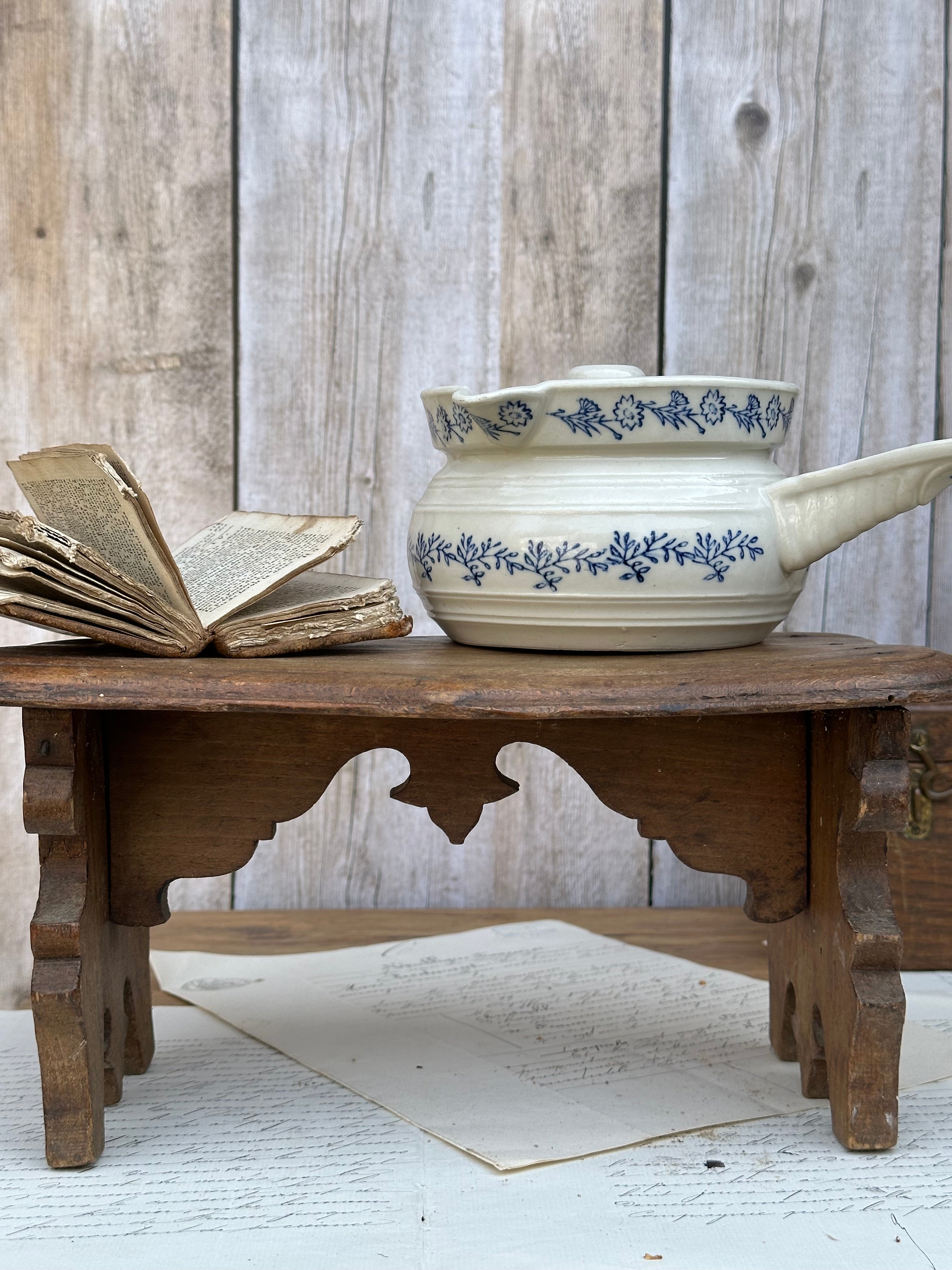 I. Small antique stool