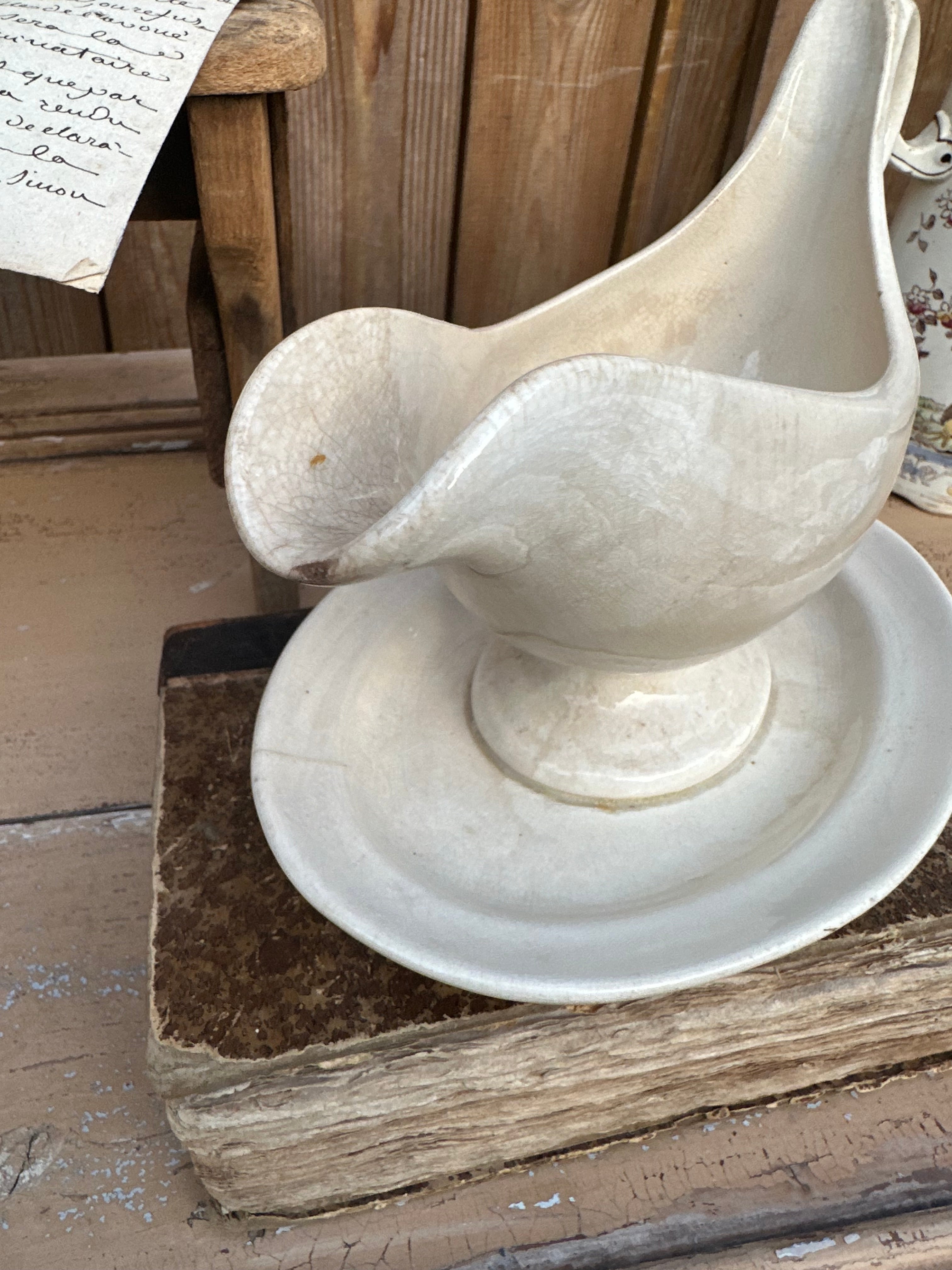 Patinated ironstone gravy boat