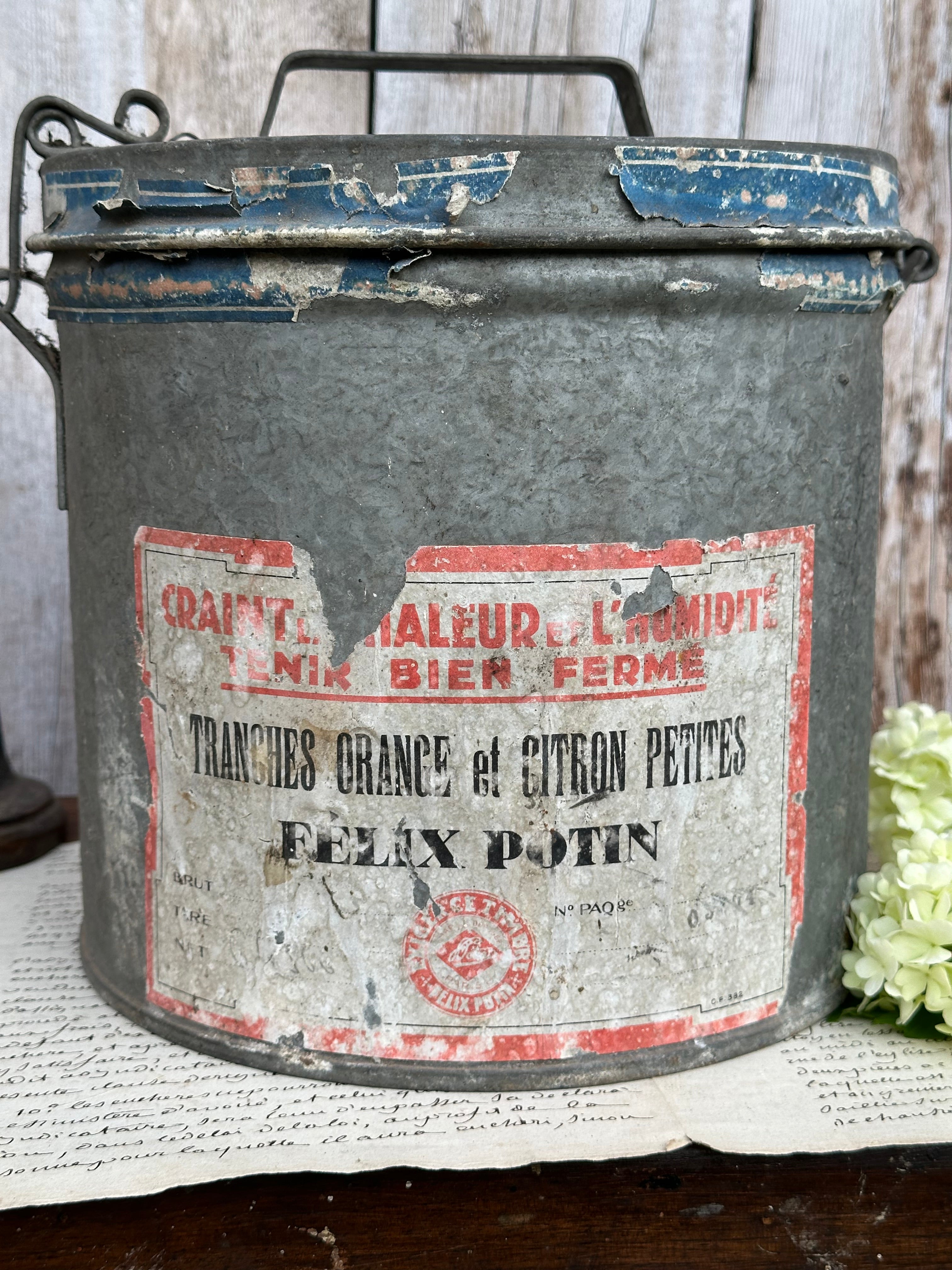 Rare et très grand pot métallique avec couvercle à fermeture Felix Potin "tranches orange et citron petite"
