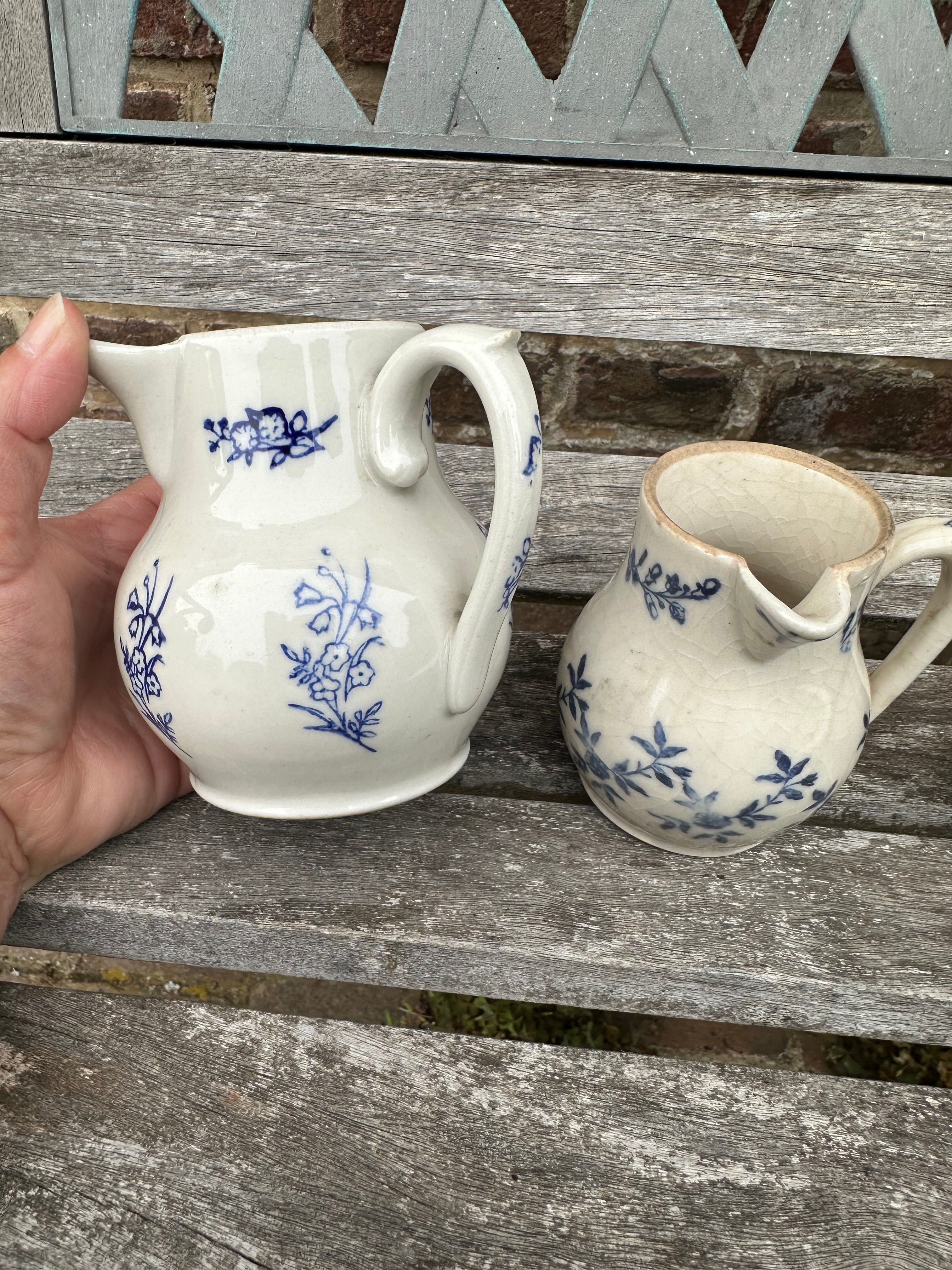 Three small St Uze pitchers