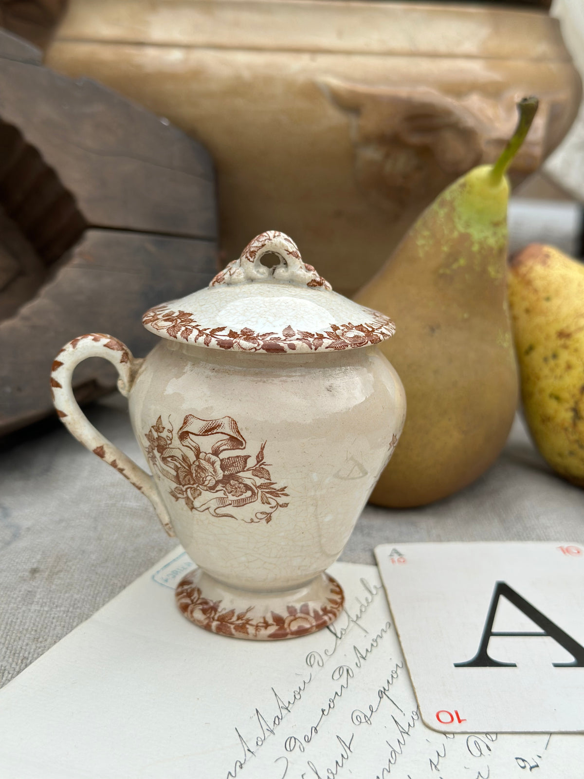 A. Pot à crème terre de fer Choisy le Roi, patiné