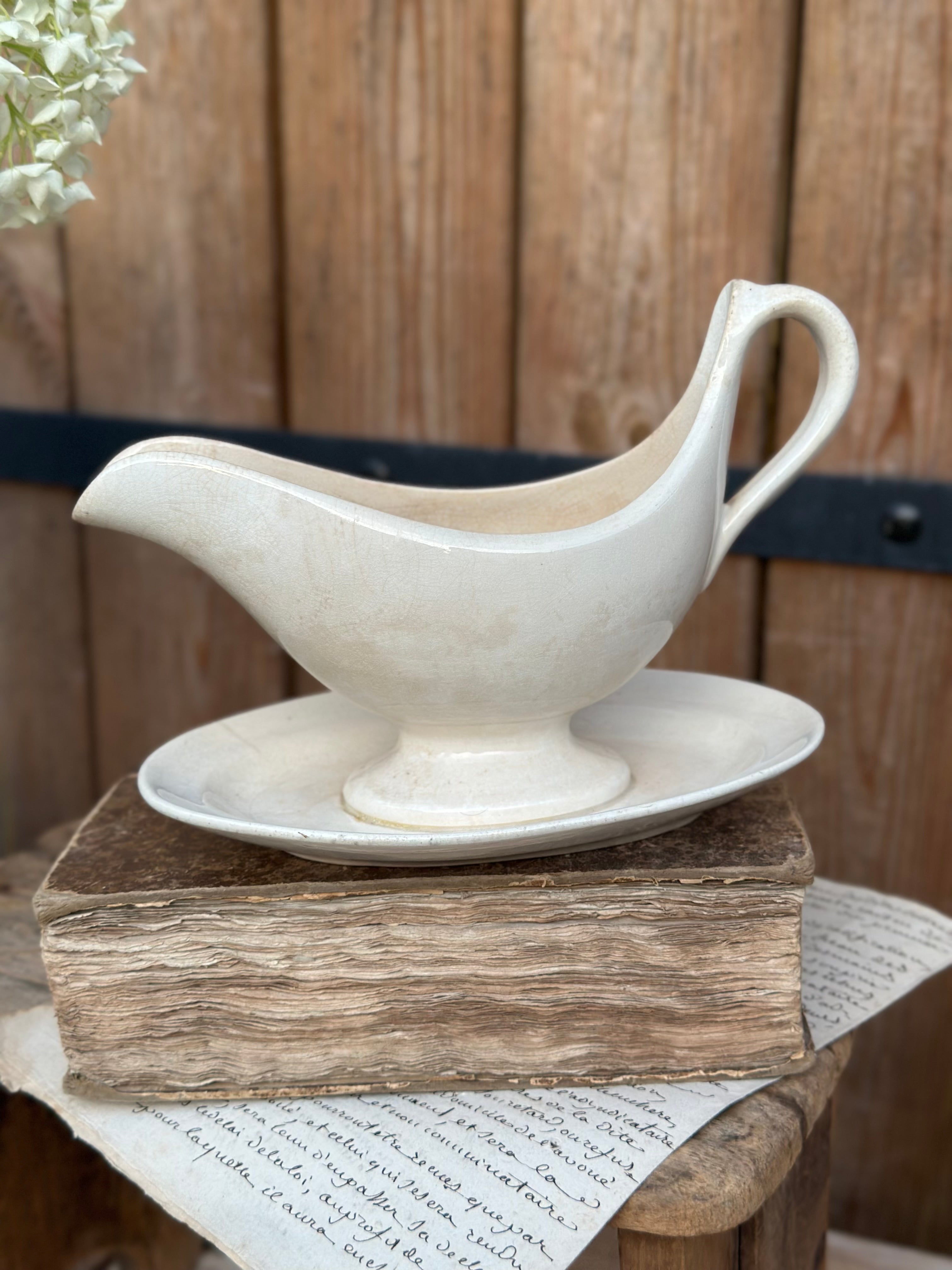 Patinated ironstone gravy boat