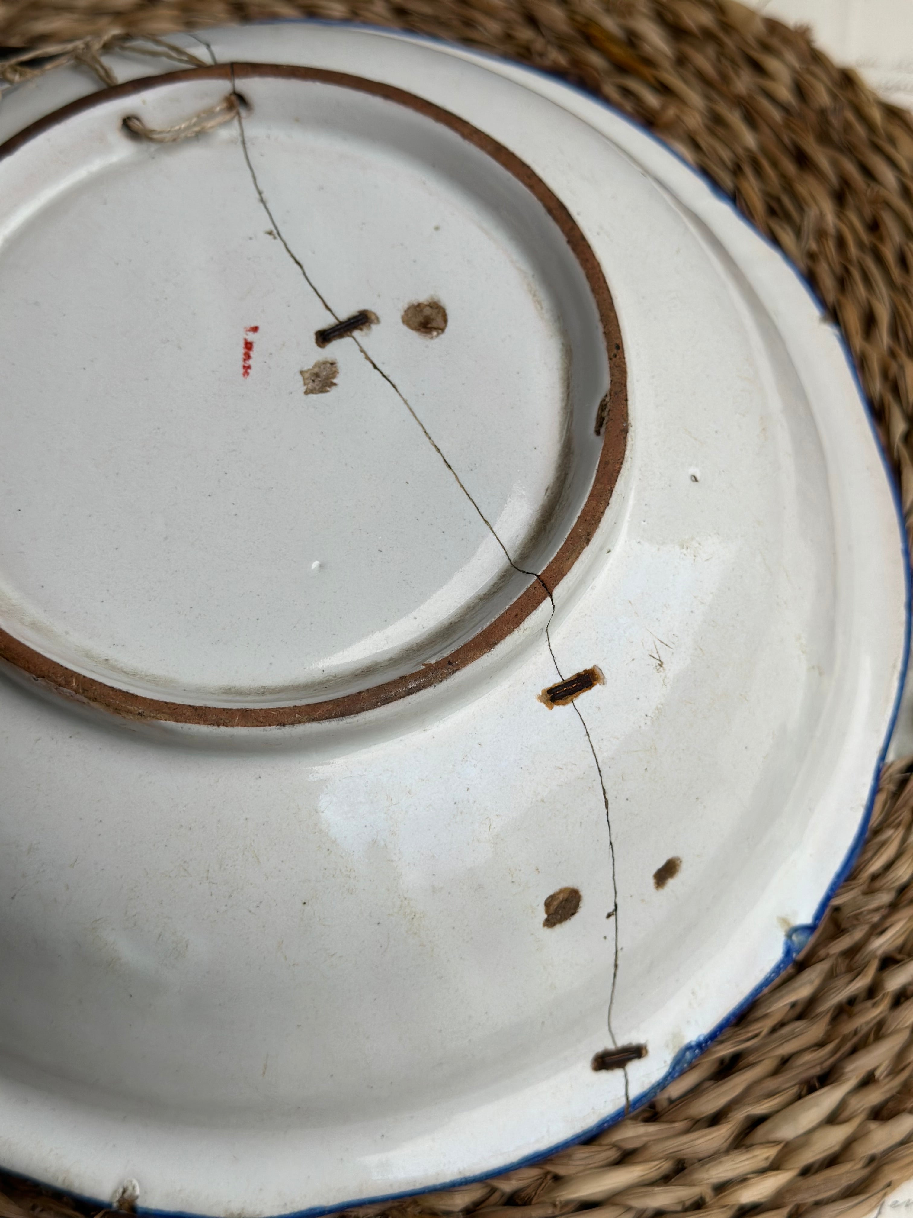 Small 19th-century salad bowl, repaired with staples