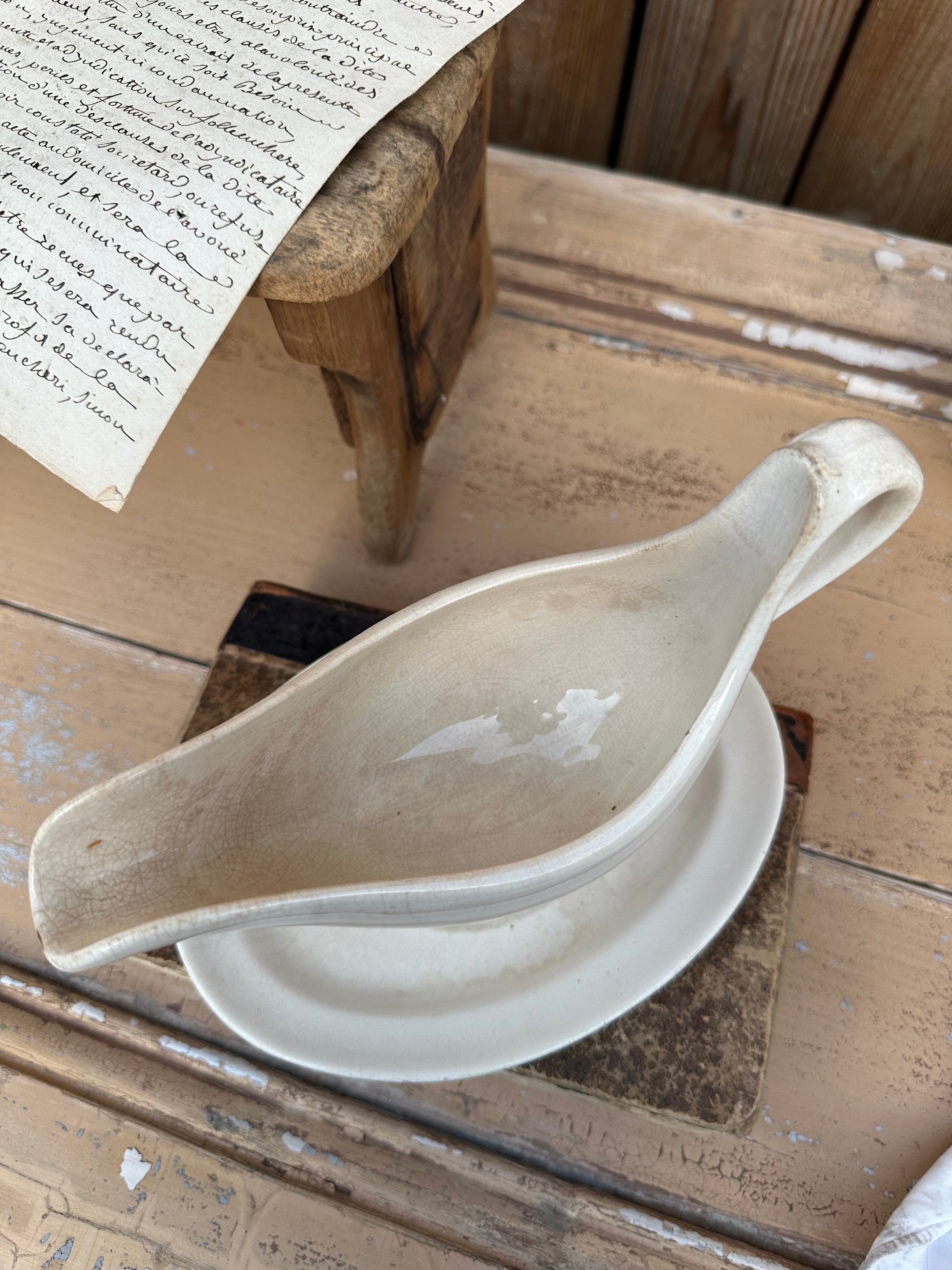 Patinated ironstone gravy boat