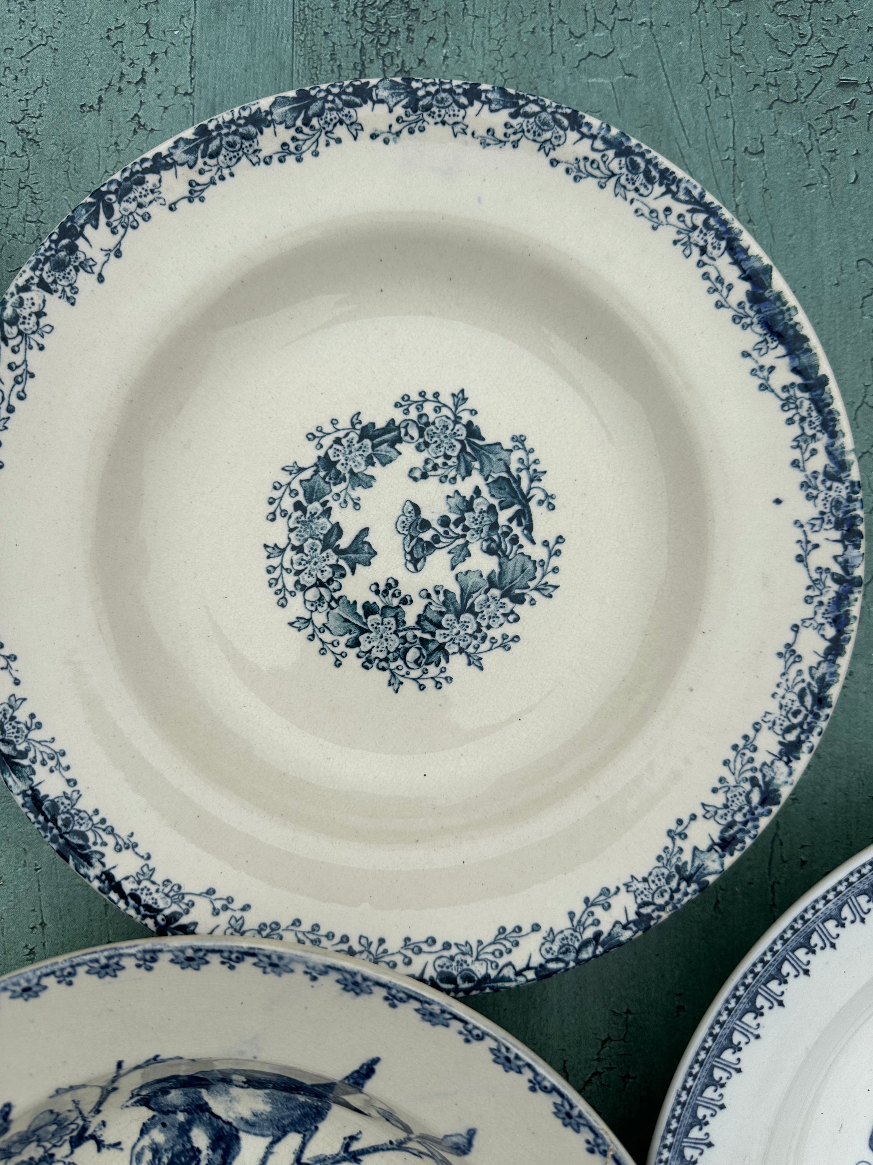 II. Set of 6 mismatched ironstone soup plates