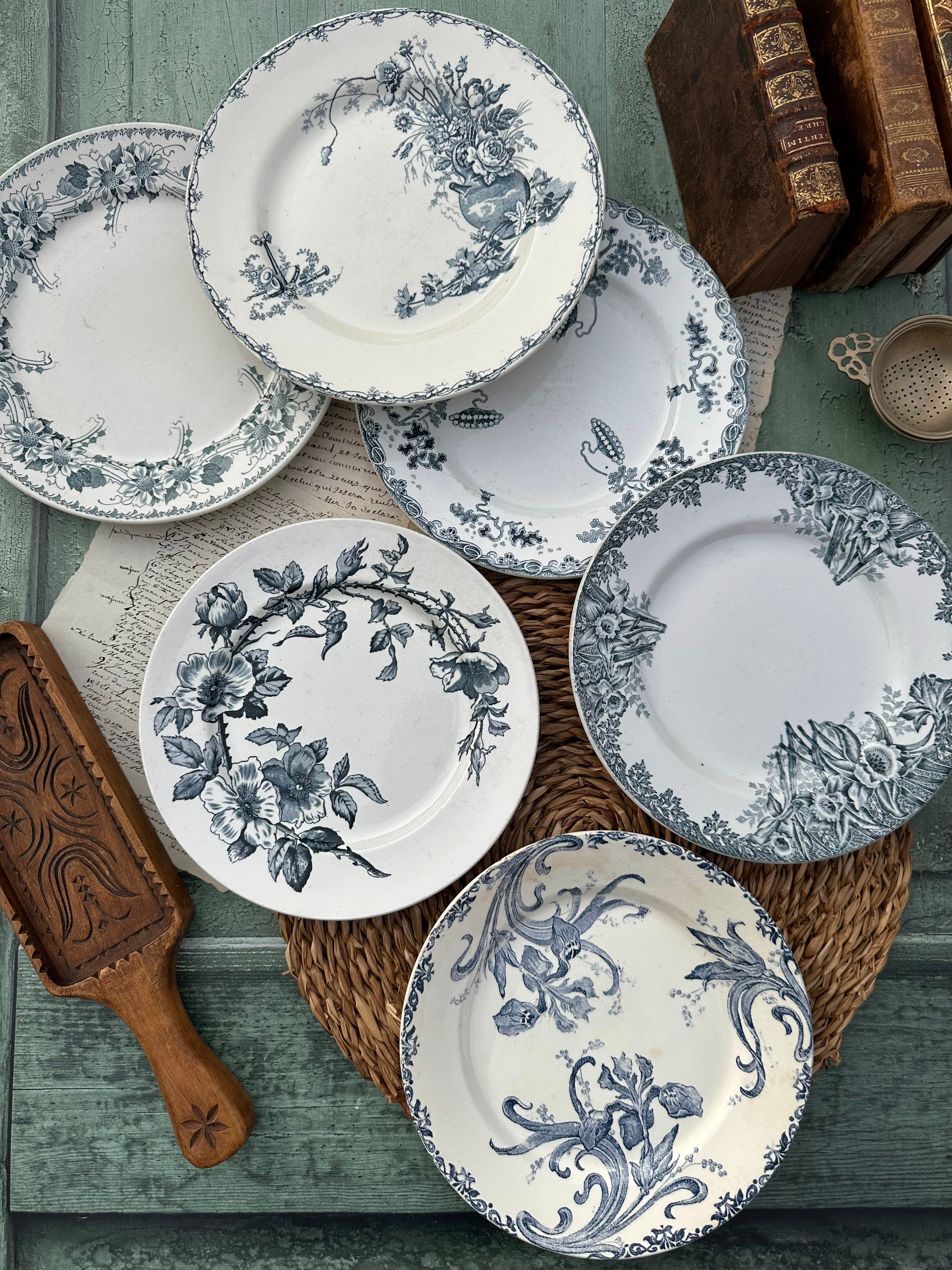 II. Set of 6 mismatched earthenware dinner plates