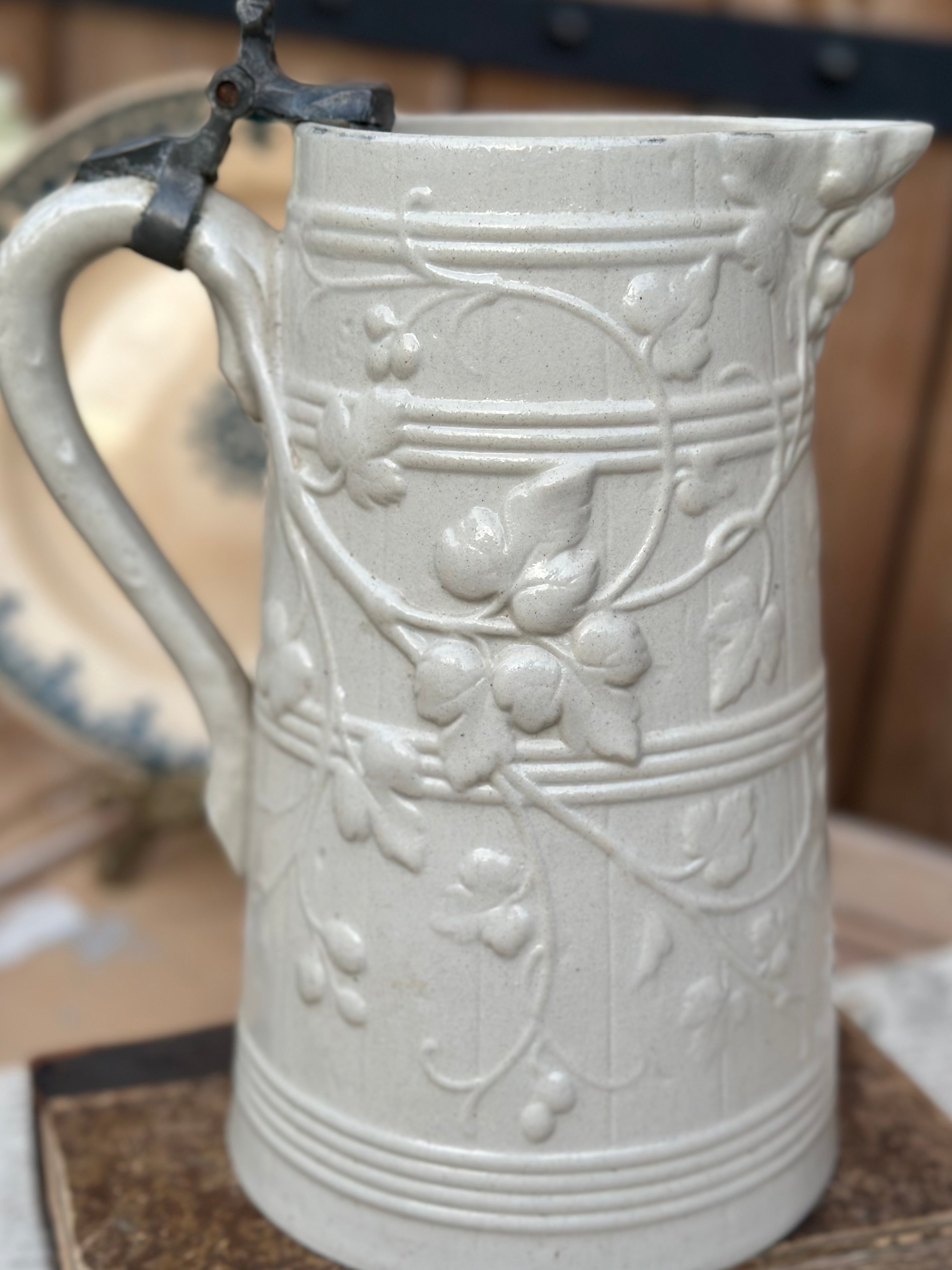 Sublime large glazed stoneware pitcher with relief - 19th century