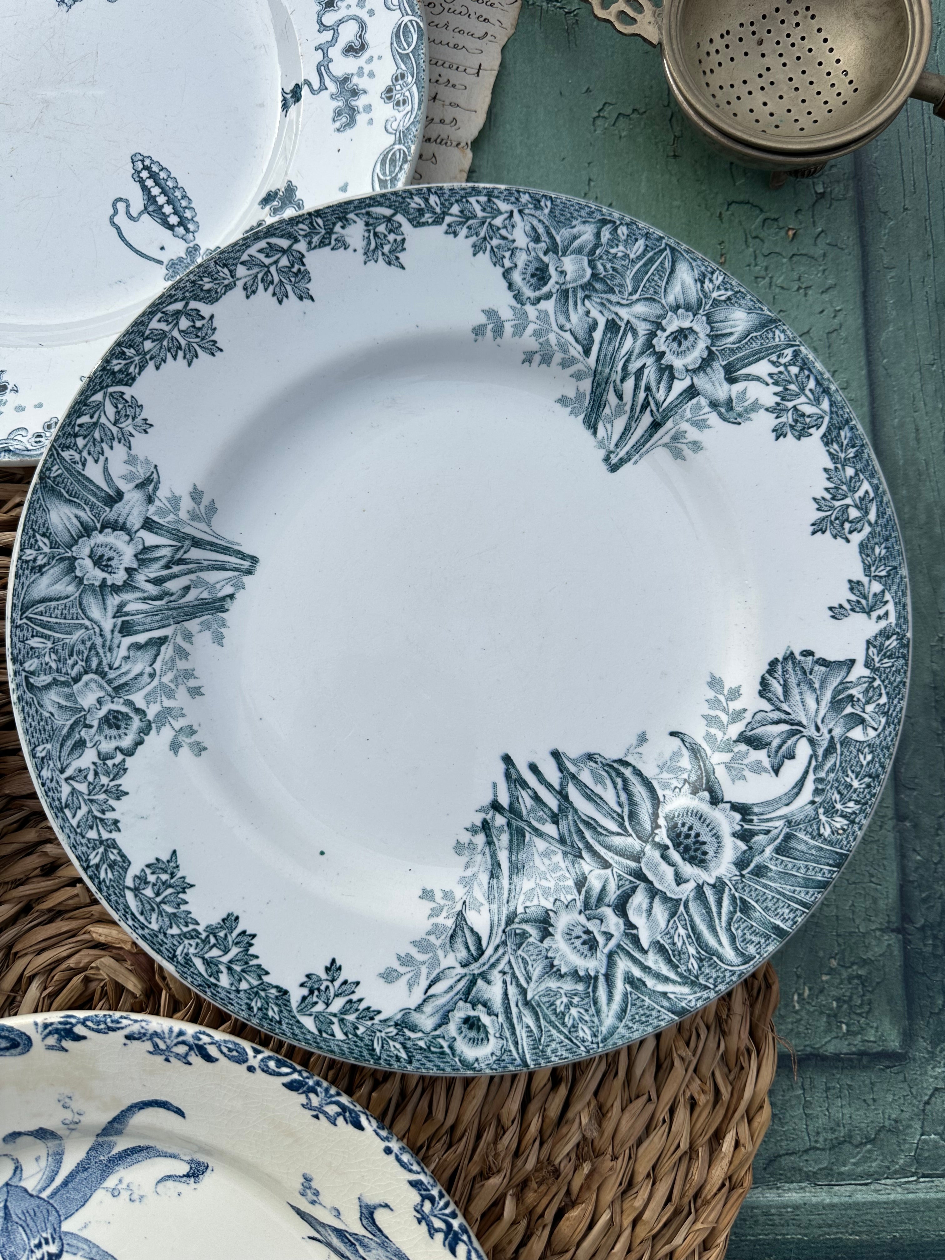 II. Set of 6 mismatched earthenware dinner plates