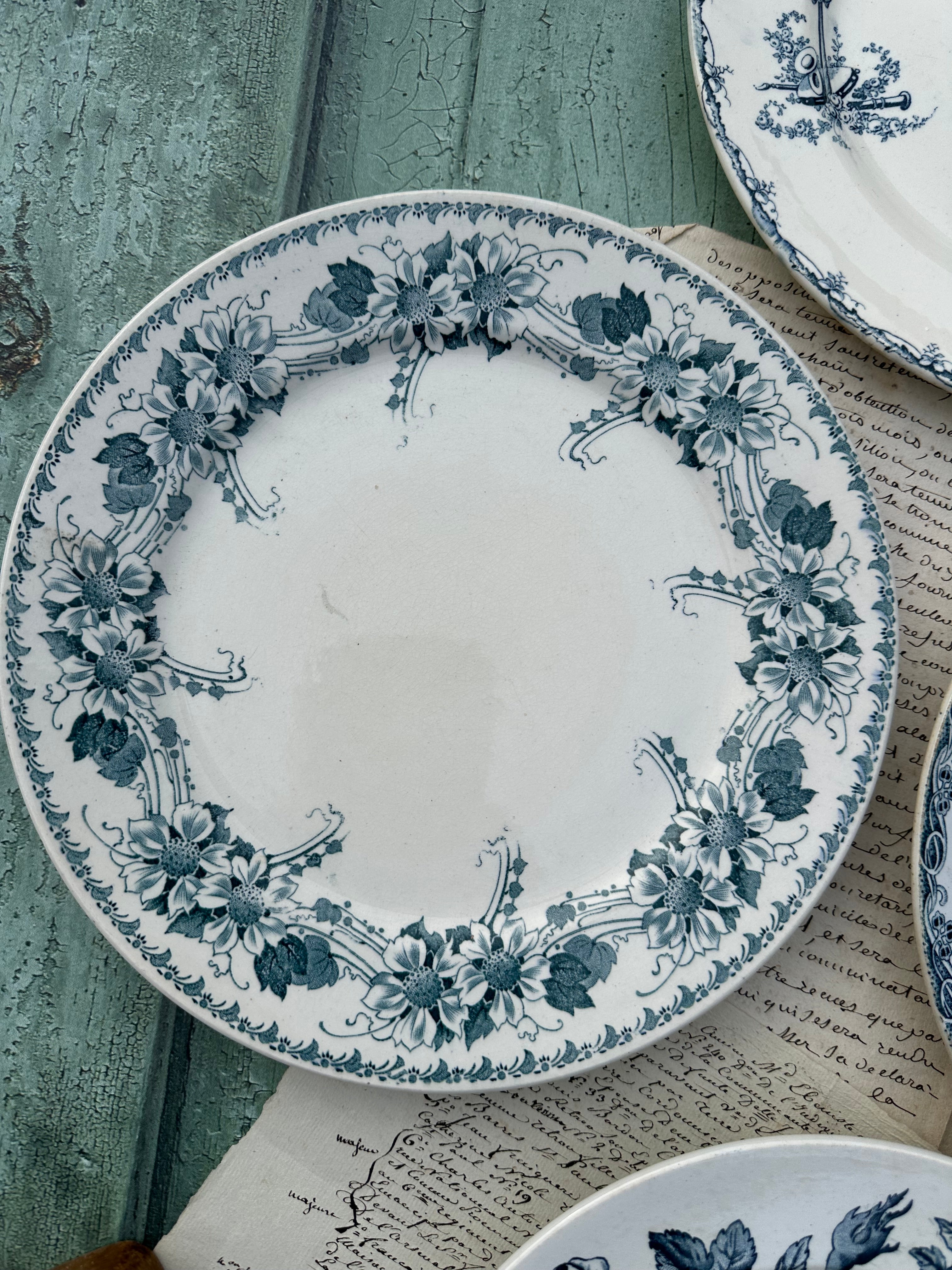 II. Set of 6 mismatched earthenware dinner plates