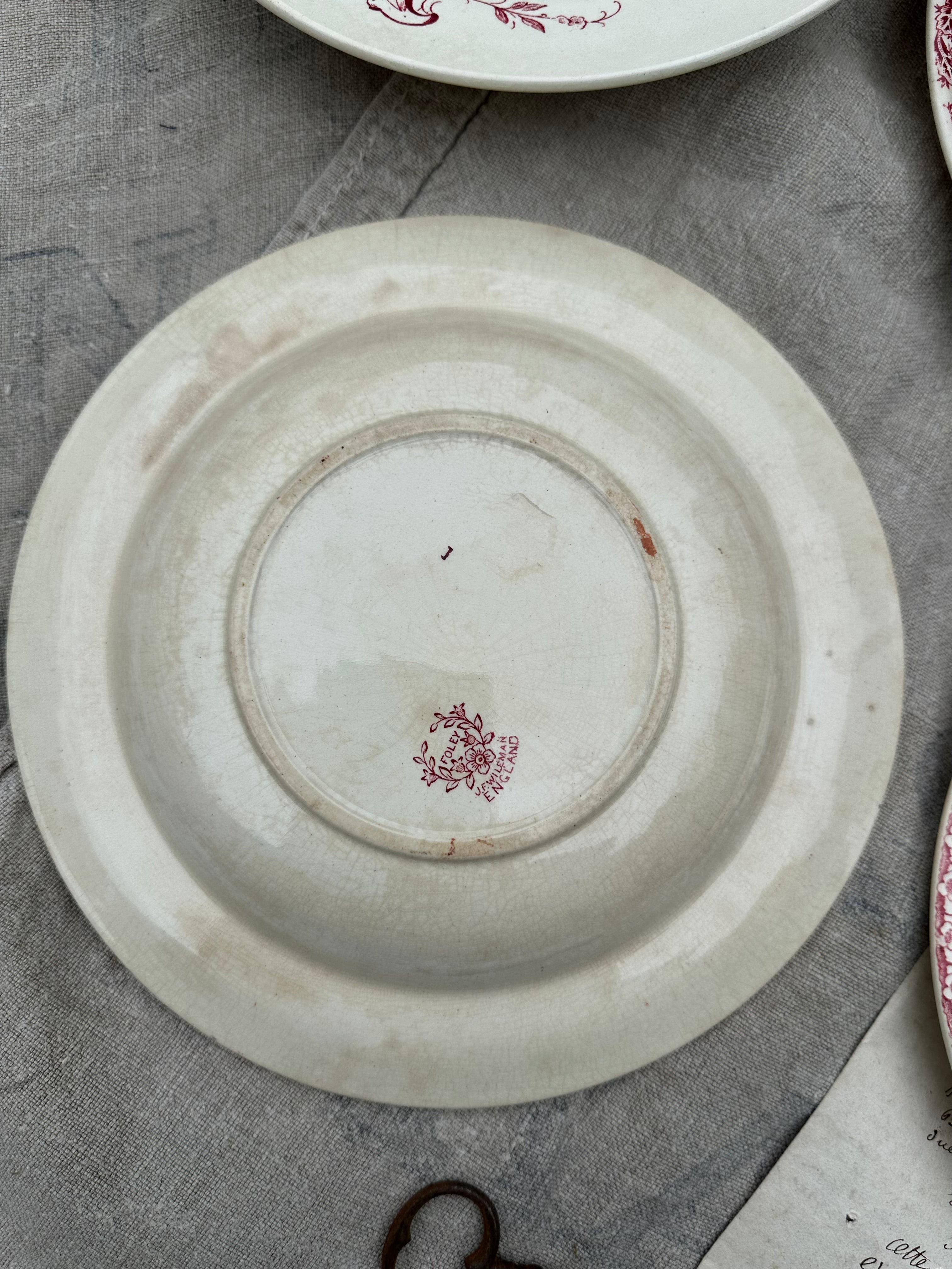 Set of 4 mismatched deep plates