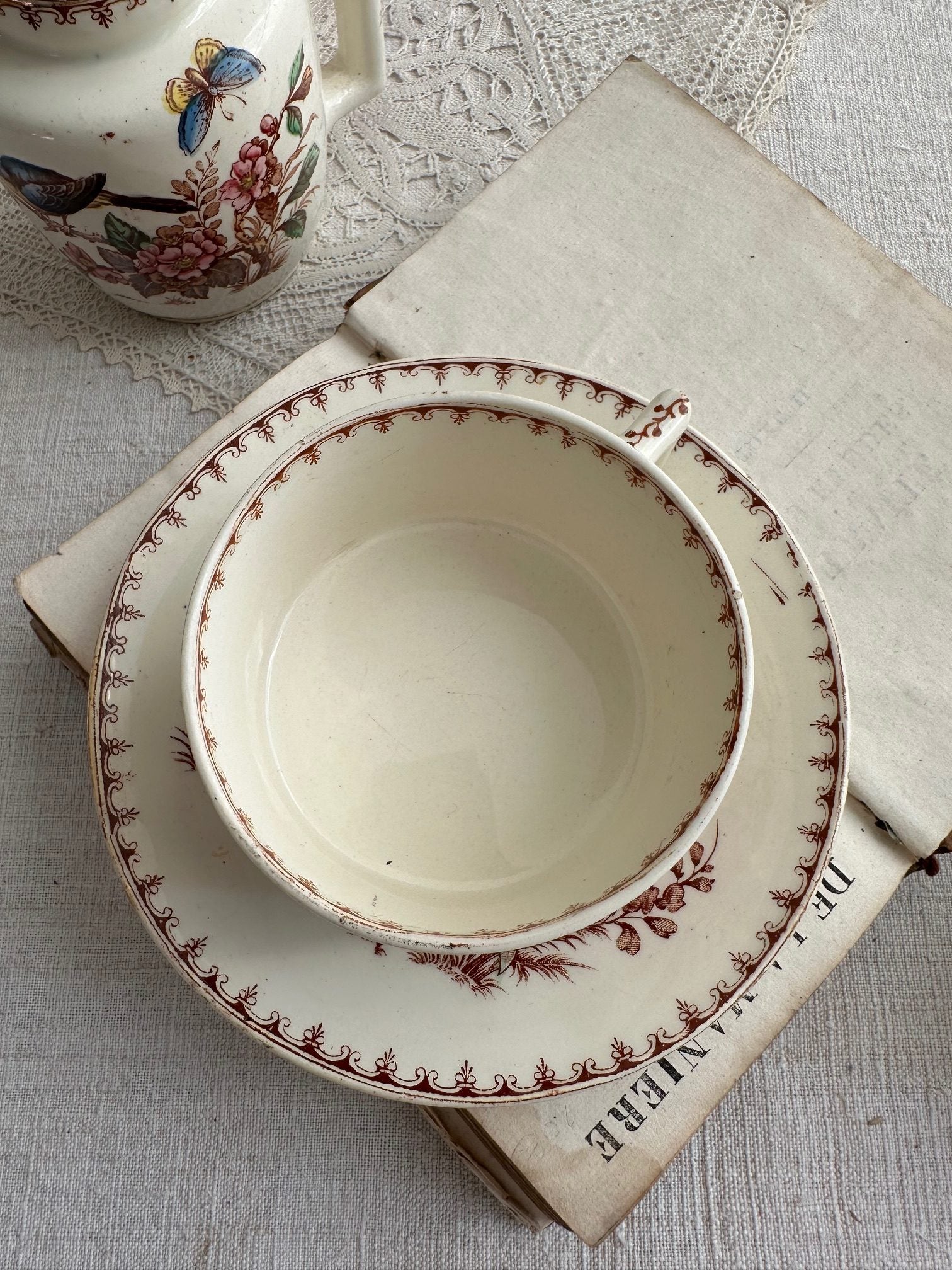 II. Polychrome ironstone teacup, Lunéville, Titmouse