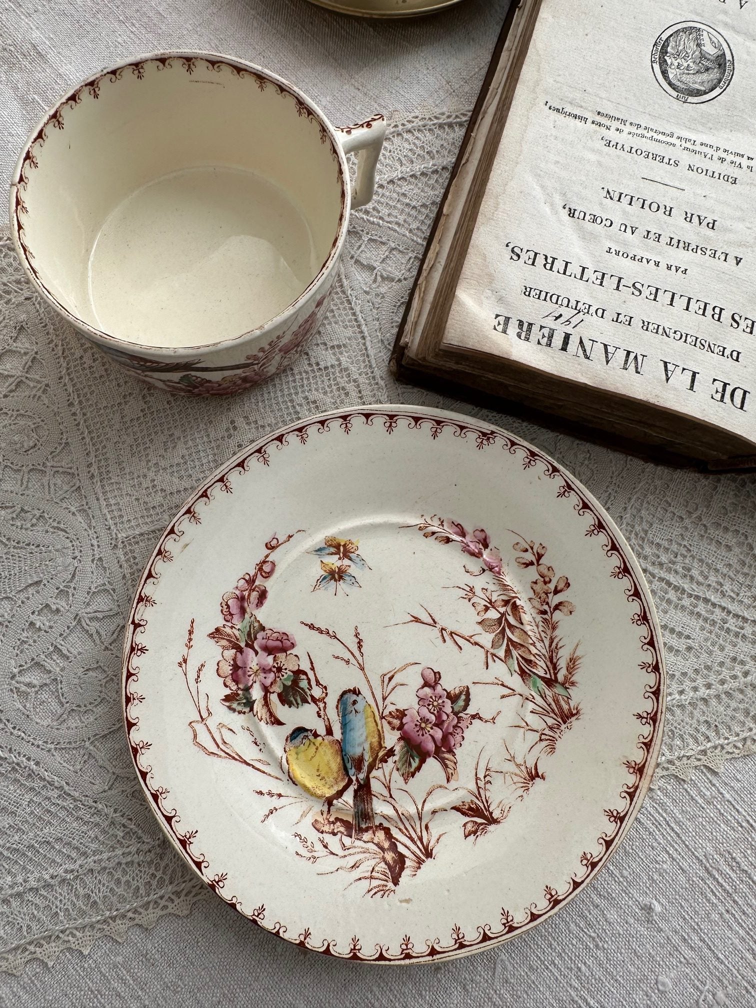 I. Polychrome ironstone teacup, Lunéville, Titmouse