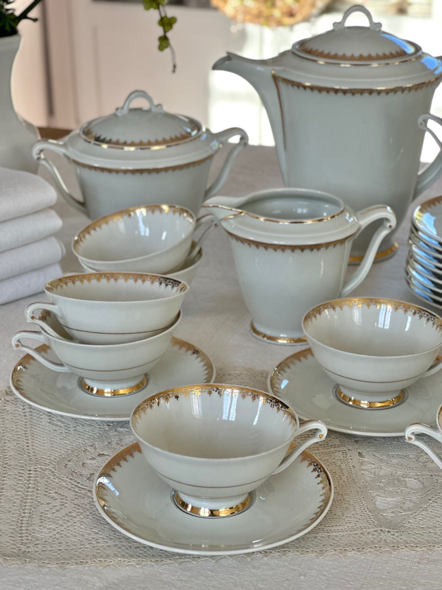 Tea service for 12 people in UC Limoges porcelain, white with a delicate gold rim
