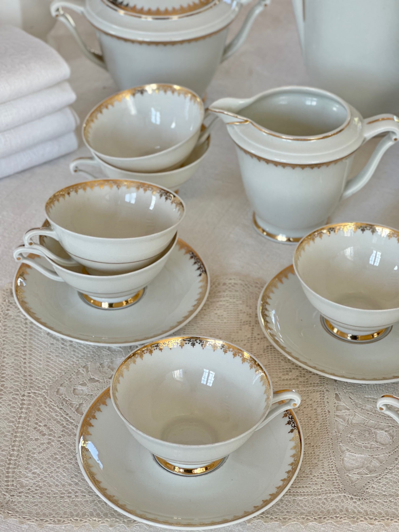 Tea service for 12 people in UC Limoges porcelain, white with a delicate gold rim