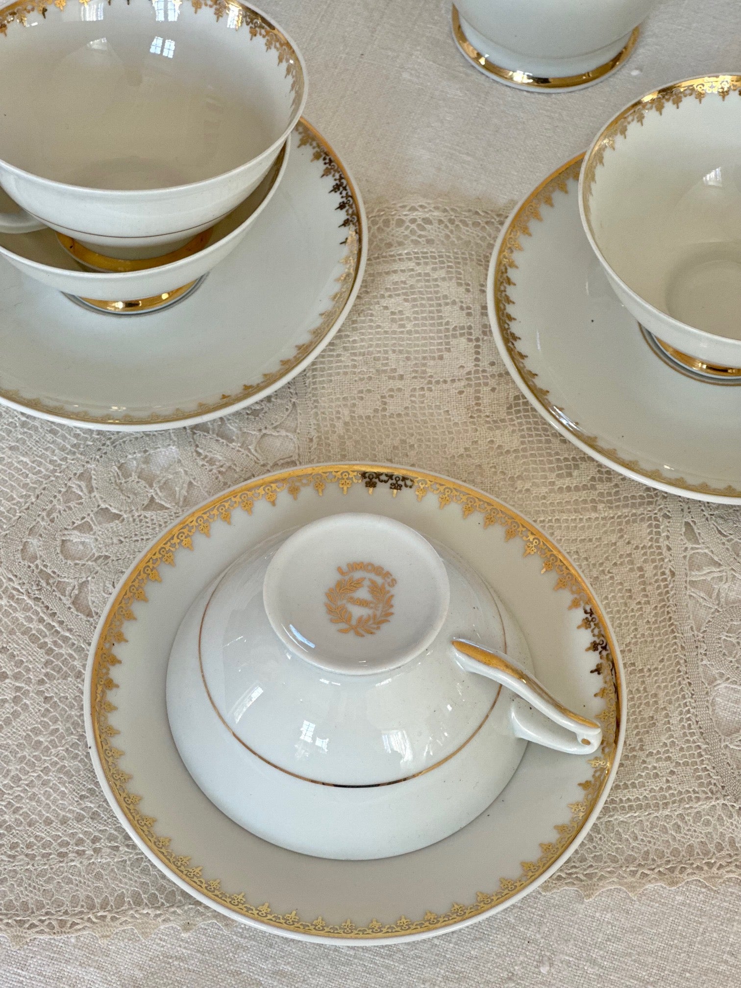 Tea service for 12 people in UC Limoges porcelain, white with a delicate gold rim