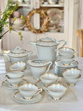 Tea service for 12 people in UC Limoges porcelain, white with a delicate gold rim