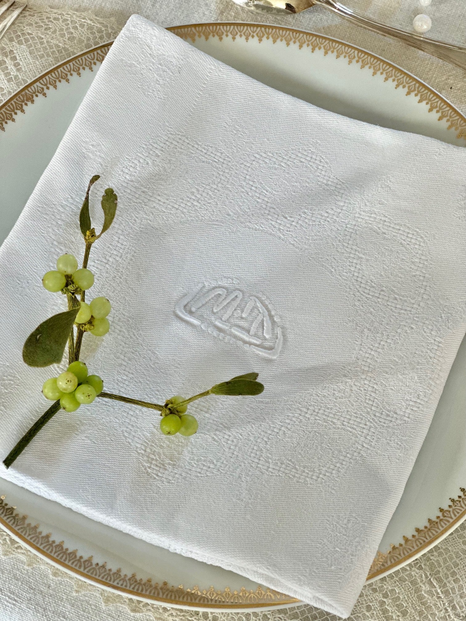 IV. Set of 12 damask cotton napkins, hand-embroidered monogram