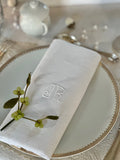 V. Set of 12 damask cotton napkins, hand-embroidered monogram